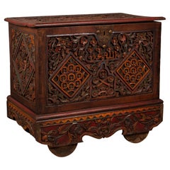Antique Indonesian Hand Carved Blanket Chest with Polychrome Design and Wheels