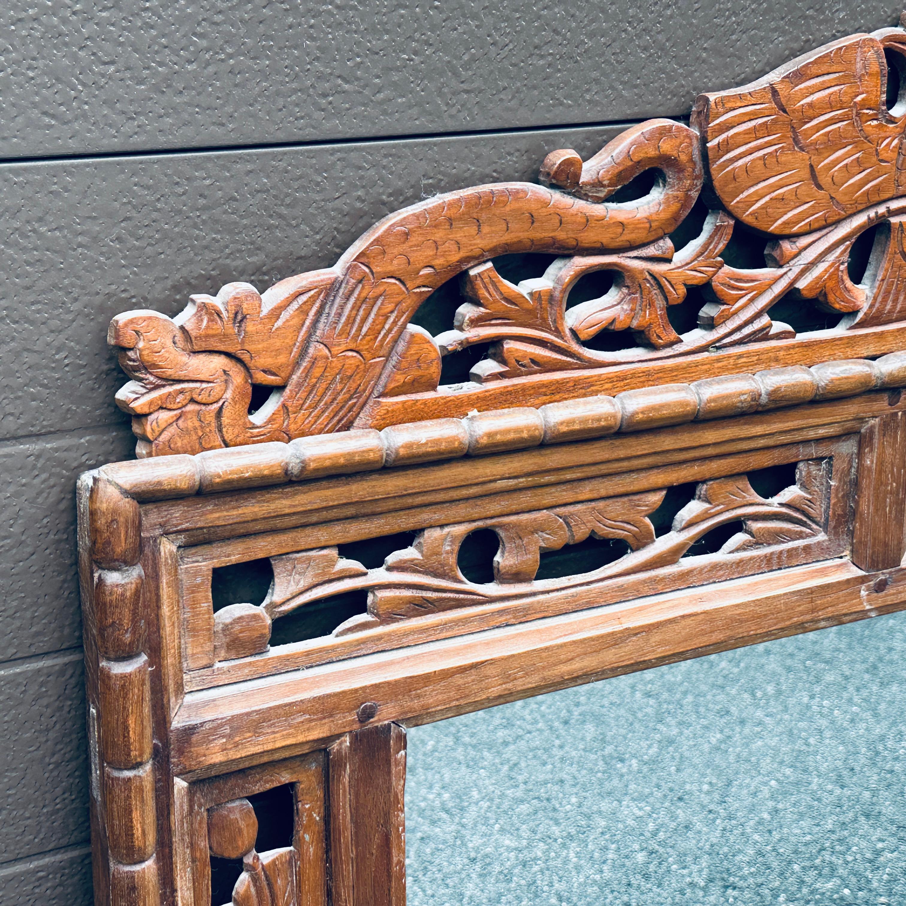 Hand-Carved Antique Indonesian Hand Carved Teak Wall Mirror With Openwork For Sale