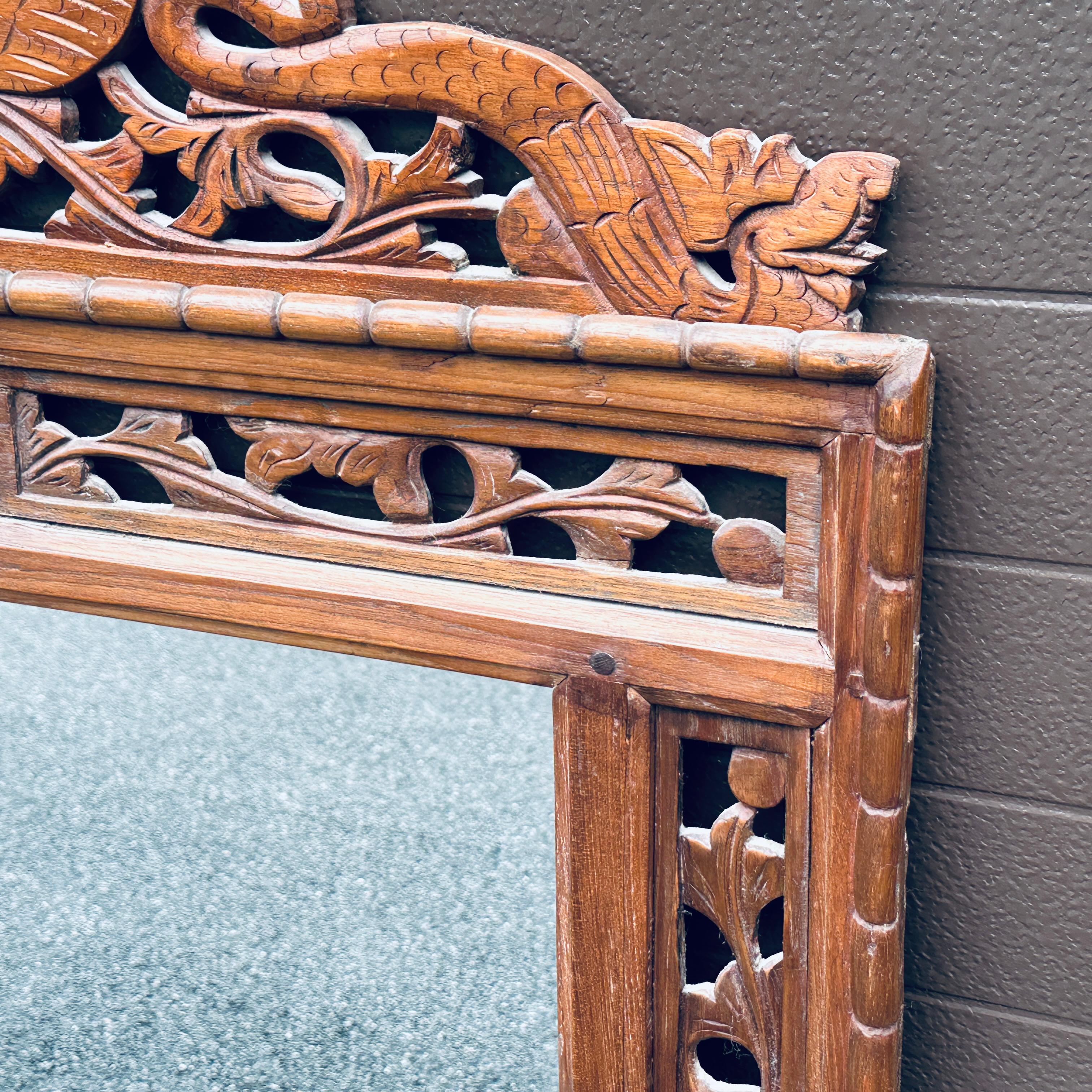 20th Century Antique Indonesian Hand Carved Teak Wall Mirror With Openwork For Sale
