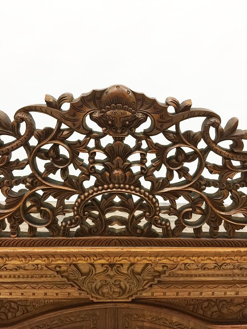 carved wall cabinet