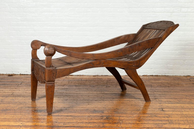 Antique Indonesian Reclining Plantation Chair With Bamboo Slats And Carved Decor For Sale At 1stdibs