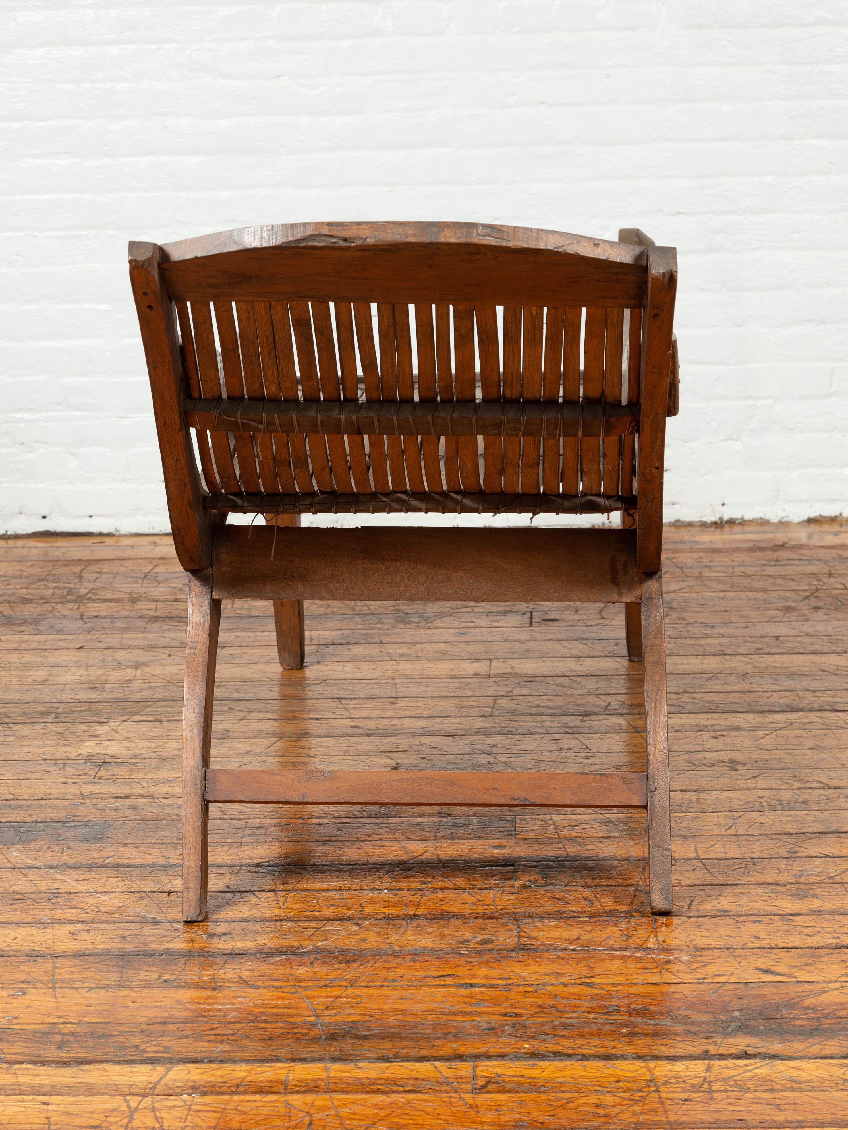 Antique Indonesian Reclining Plantation Chair with Bamboo Slats and Carved Décor For Sale 2