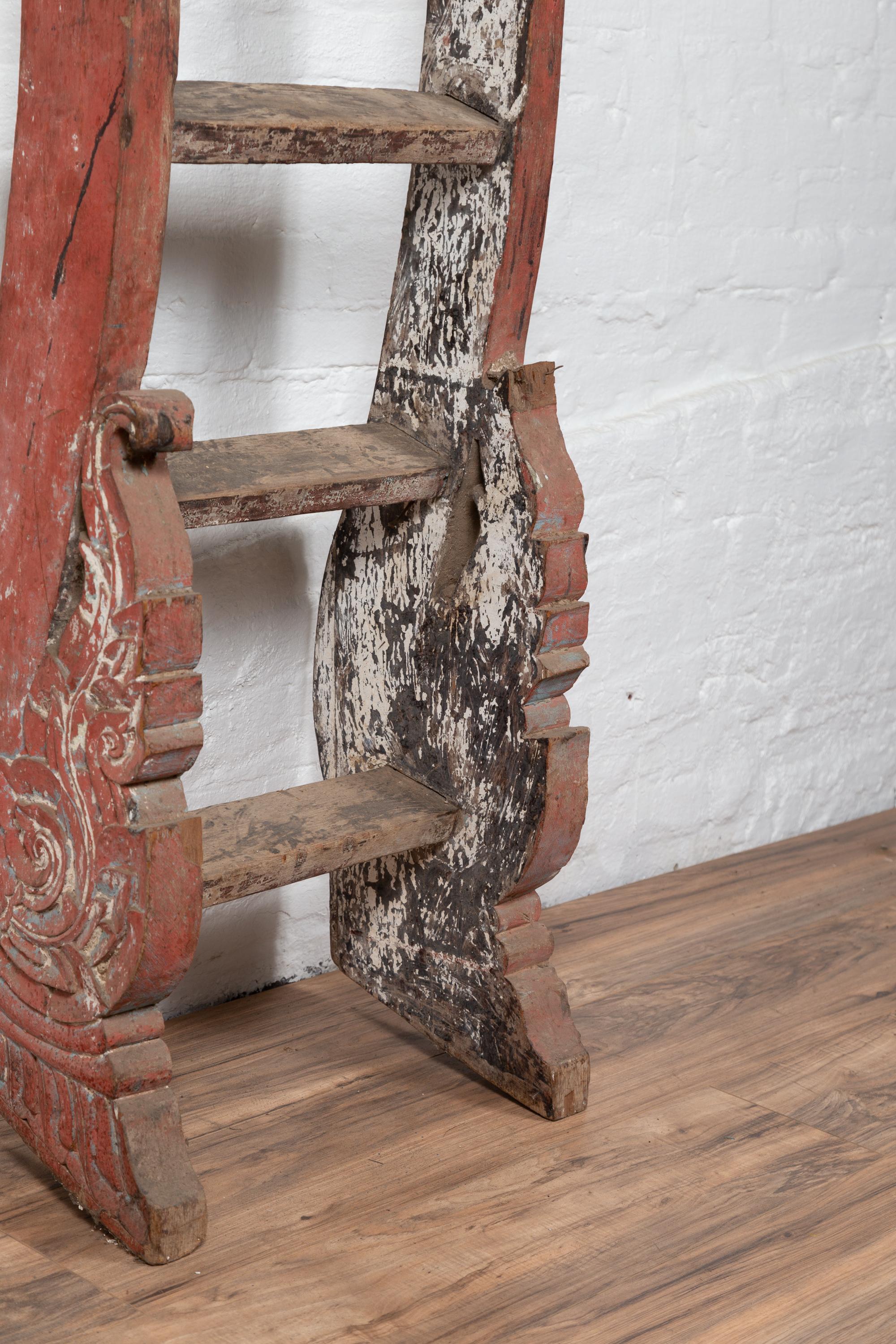 Antique Indonesian Red Painted and Hand Carved Ladder with Distressed Finish 5
