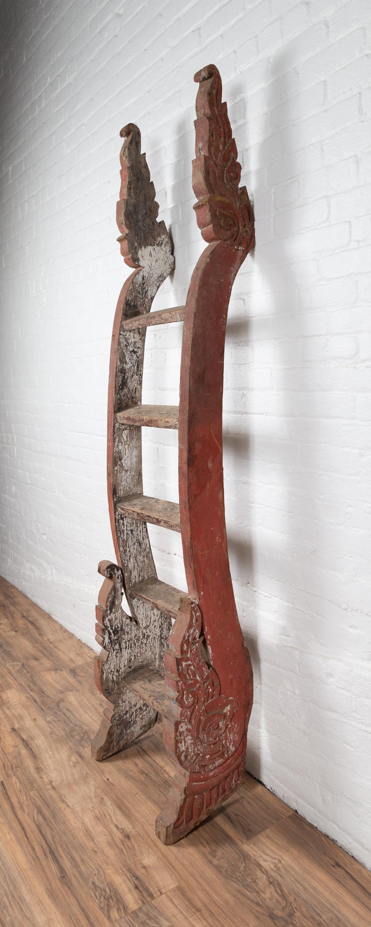 20th Century Antique Indonesian Red Painted and Hand Carved Ladder with Distressed Finish