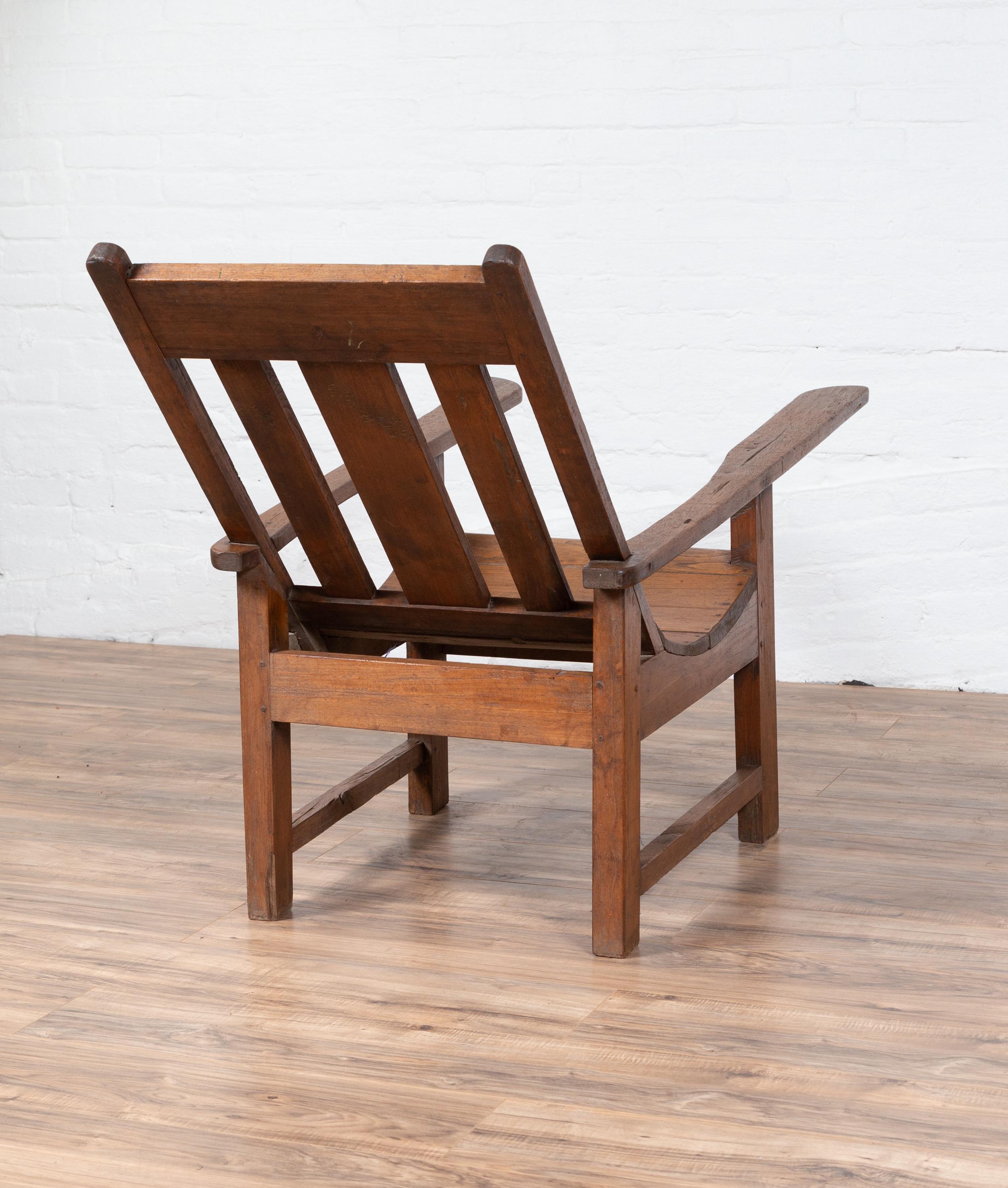 20th Century Antique Indonesian Teak Plantation Lounge Chair from Madura with Slanted Back For Sale