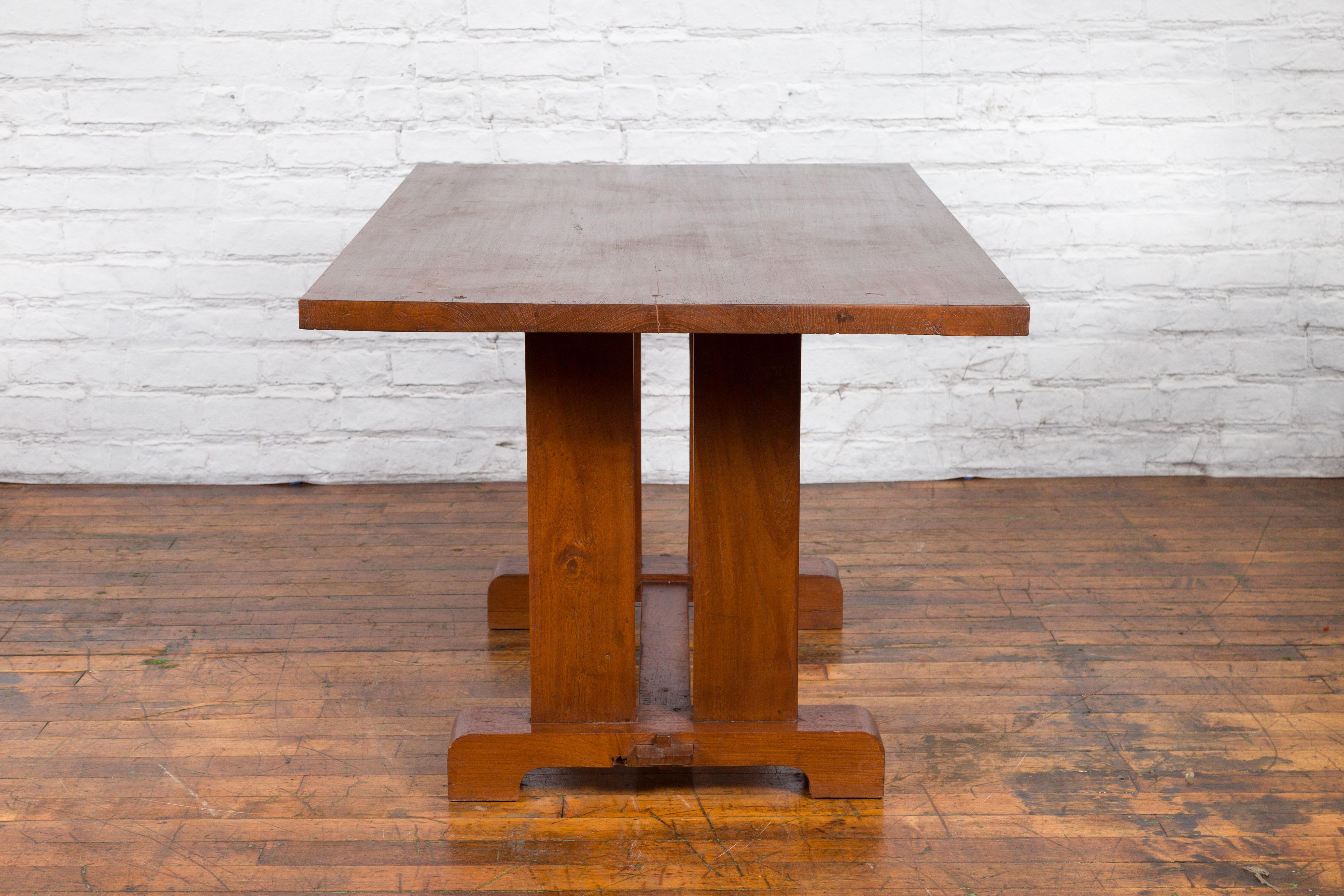 Antique Indonesian Teakwood Dining Table with Trestle Base and Brown Patina For Sale 6