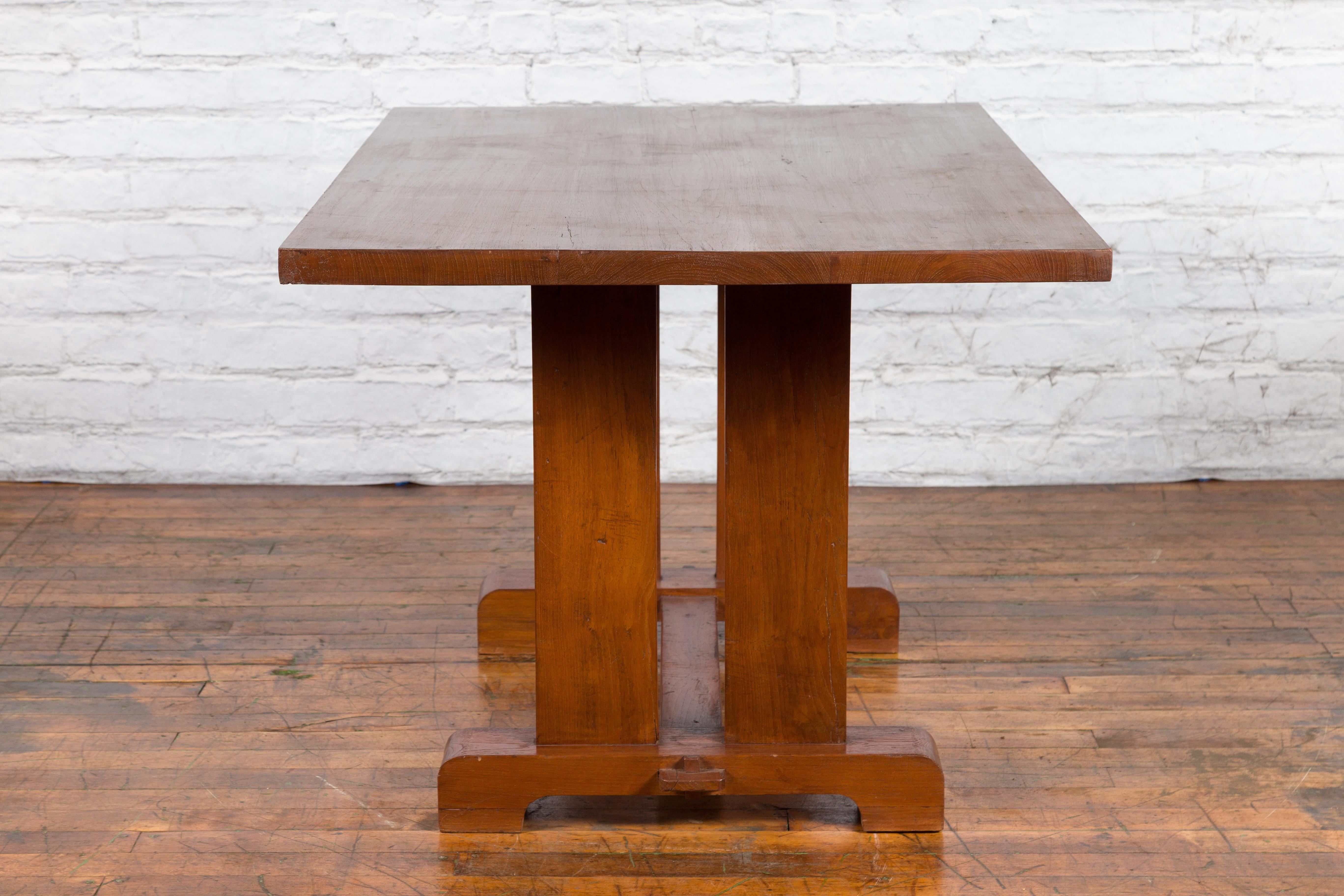 Antique Indonesian Teakwood Dining Table with Trestle Base and Brown Patina For Sale 2