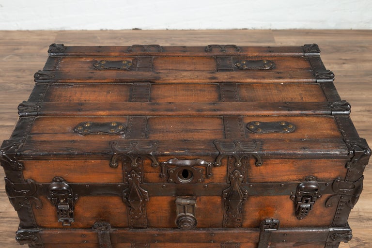 Antique Indonesian Travel Treasure Chest with Brown Patina and Leather Details In Good Condition In Yonkers, NY