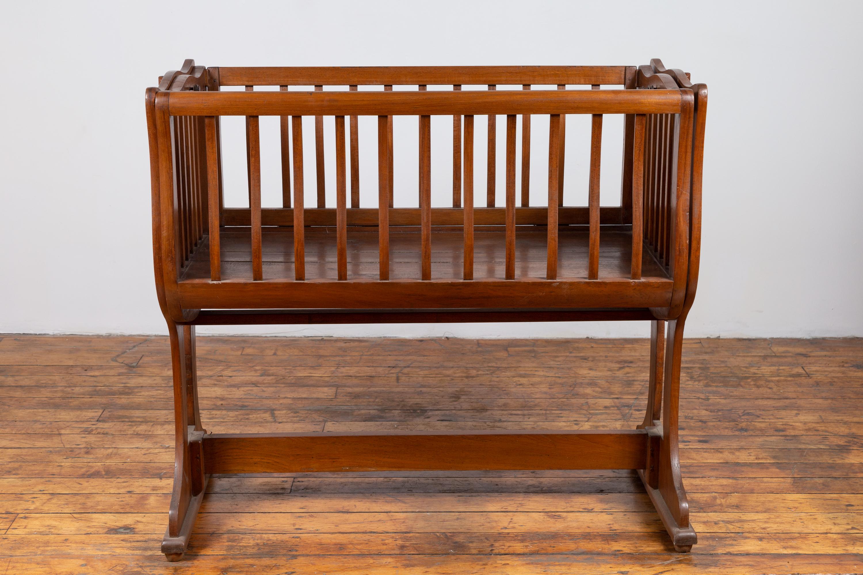 20th Century Antique Indonesian Wooden Baby Cradle Transforming into a Loveseat For Sale