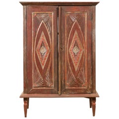 Used Indonesian Wooden Cabinet with Carved and Painted Geometric Motifs