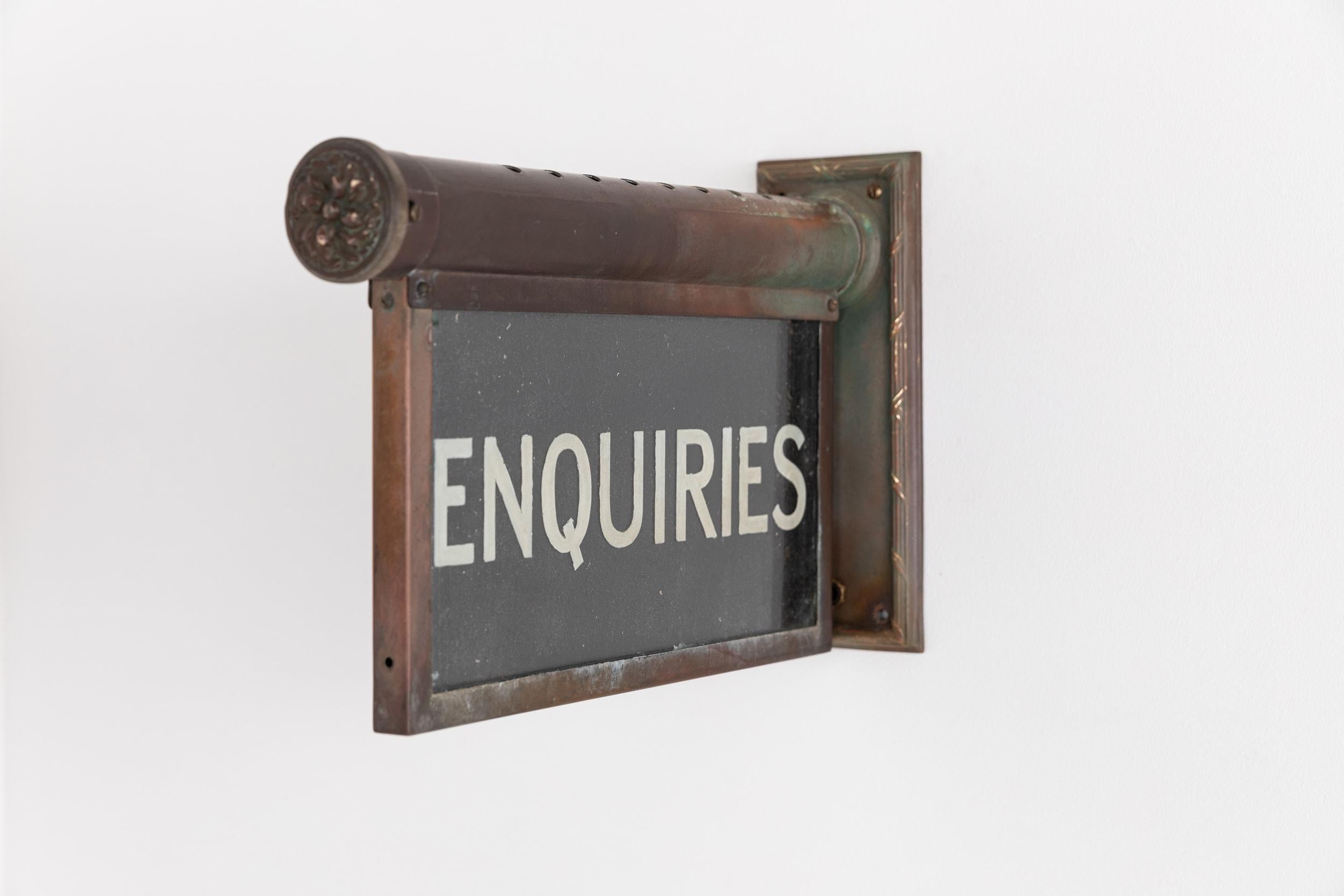 

A stunning illuminated 'Internalite' directional sign made in England by K.F.M Engineering. c.1920.

Wall mounted brass frame housing the internal illuminations above single sided polished plate glass etched with 'Enquries'. Frame stamped with