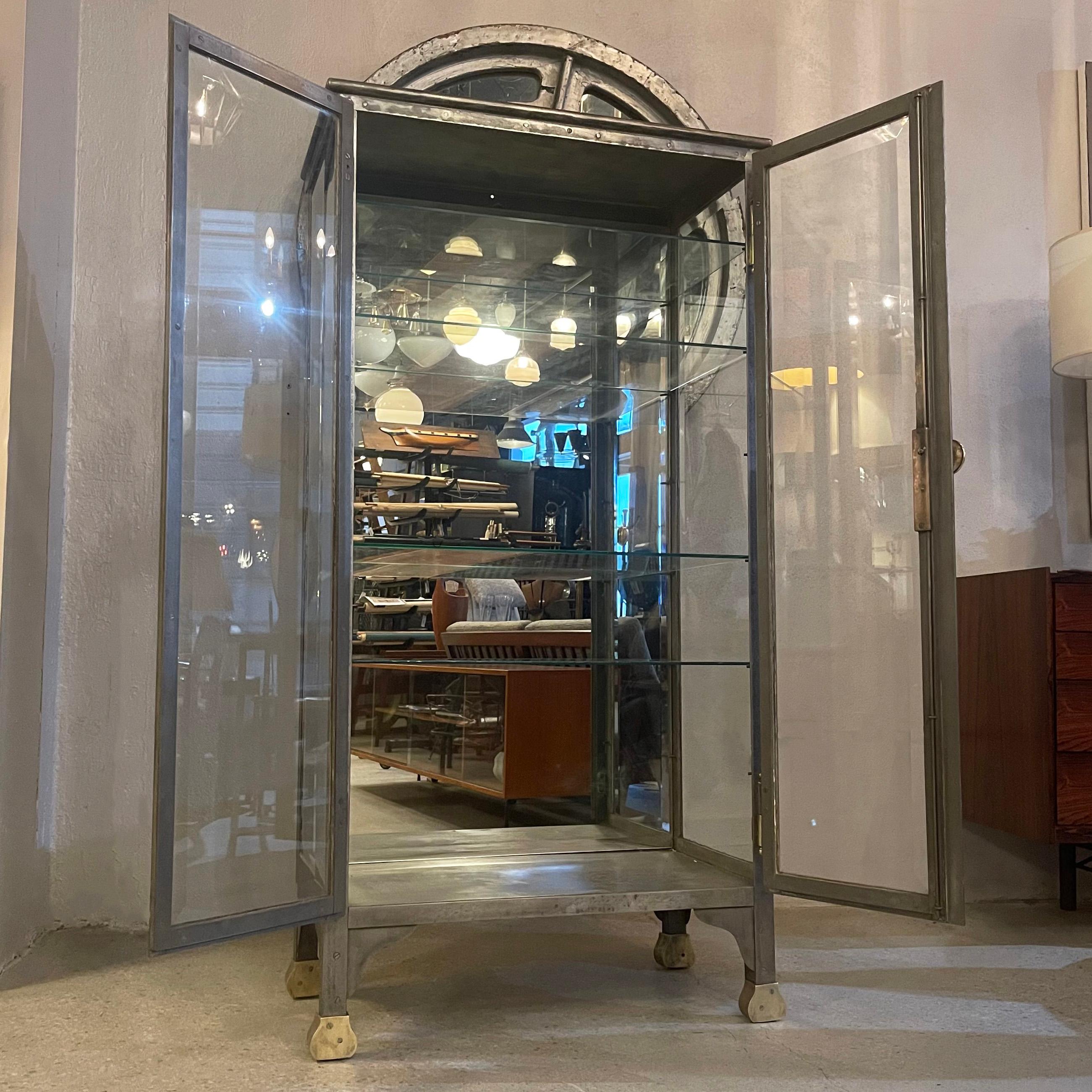 Antique Industrial Brushed Steel Double Door Apothecary Display Cabinet In Good Condition For Sale In Brooklyn, NY