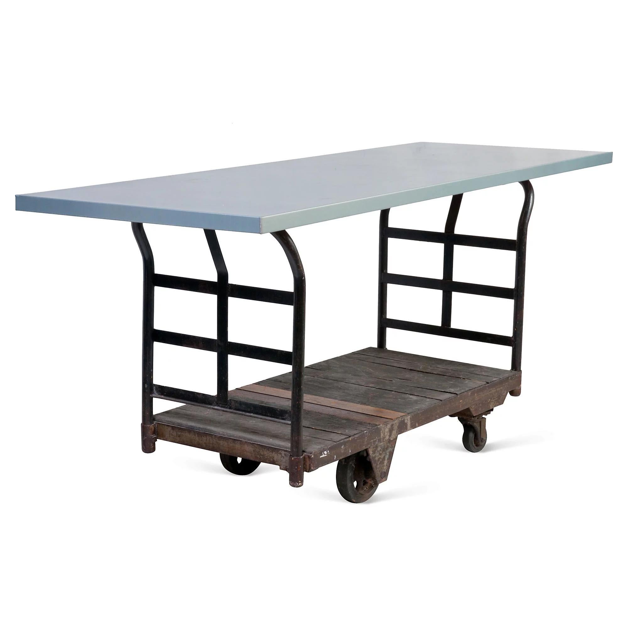 Experience the perfect blend of rustic and modern design with our exquisite wood and metal industrial cargo cart on caster wheels! Its rugged yet sophisticated style will add an edge to any space. Use it to showcase your favorite art pieces or