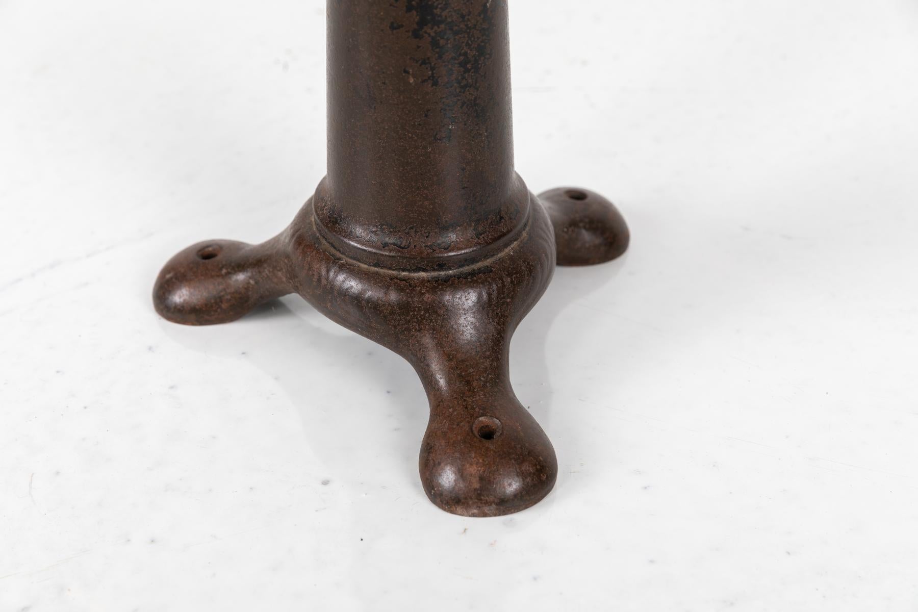A rare and early cast iron industrial machinist stools by Singer. c.1900

A bit of an odd-ball, this stool has all the proportions and design of the early claw foot singer stool, but with rounded toes. We're unsure if at some point in it's history