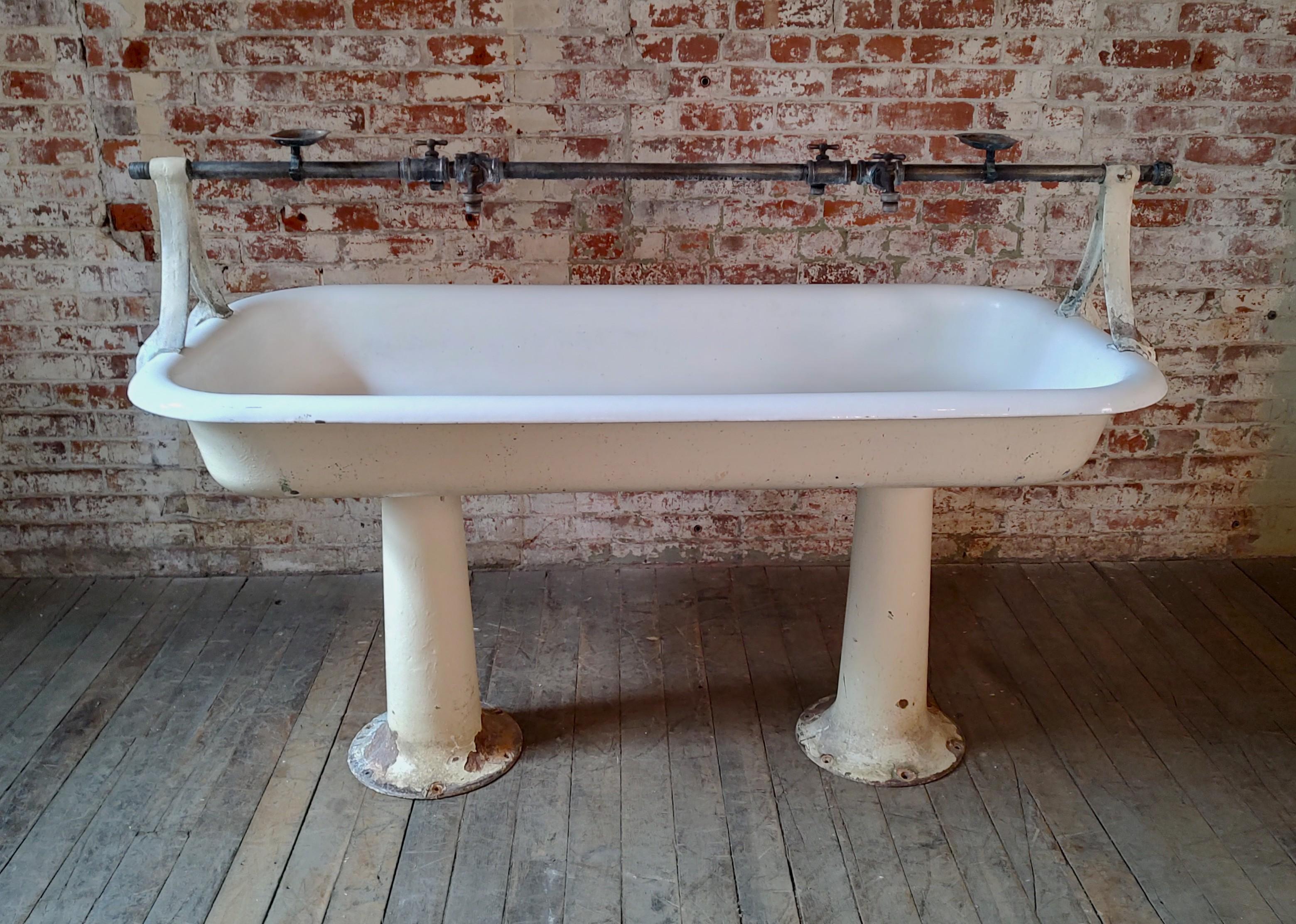 Vintage Two-Sided Functional Sink with 4 Faucets

Overall Dimensions: 31″ x 64″ x 45″ high

Basin Dimensions: 31″ x 61″ x 31 1/2″ high

Materials: Cast Iron
