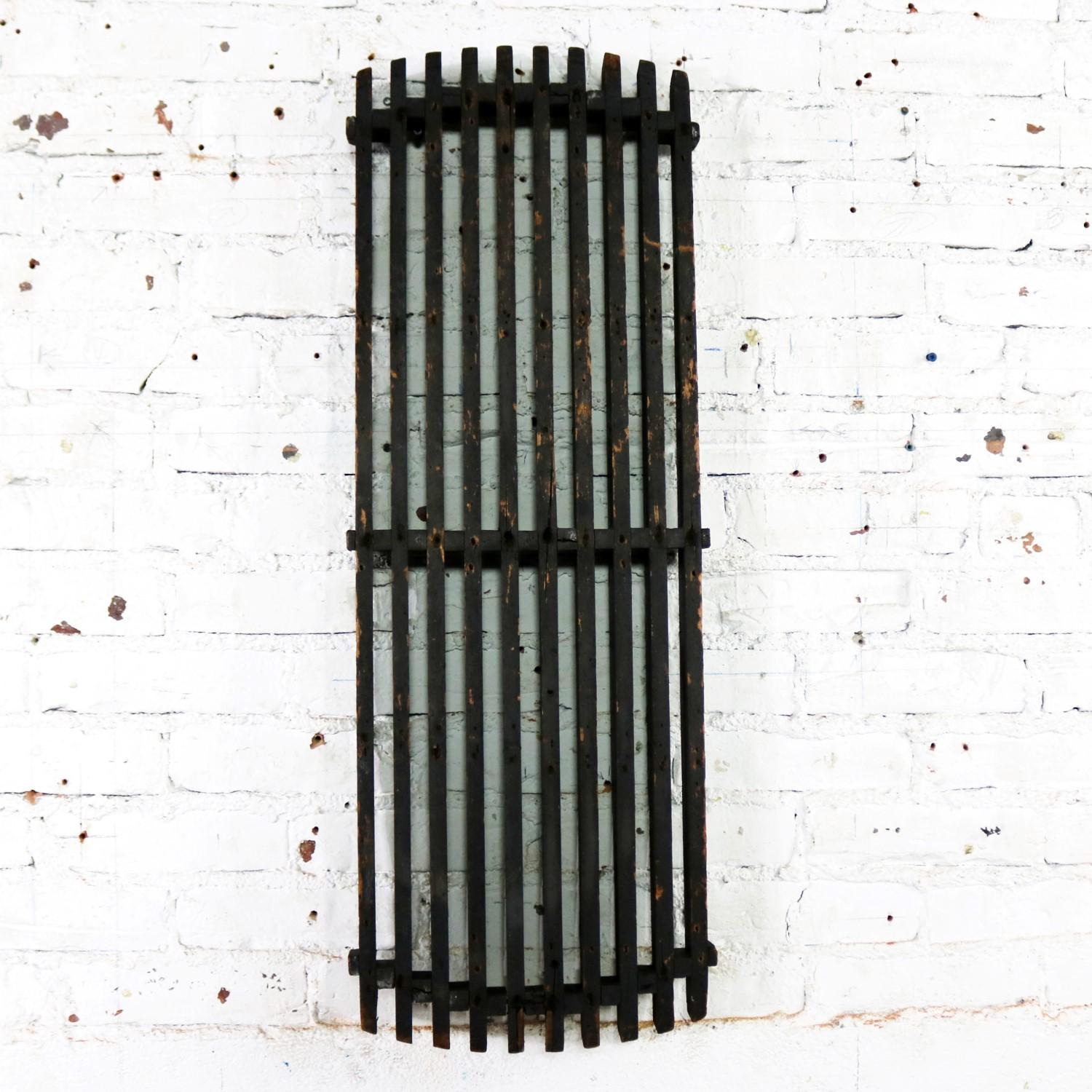 Incredible antique handmade wood industrial foundry pattern. A single long narrow slatted form. This was created to make the sand cast molds for casting an iron sewage grates or other type grill. It is in wonderful antique condition with fabulous