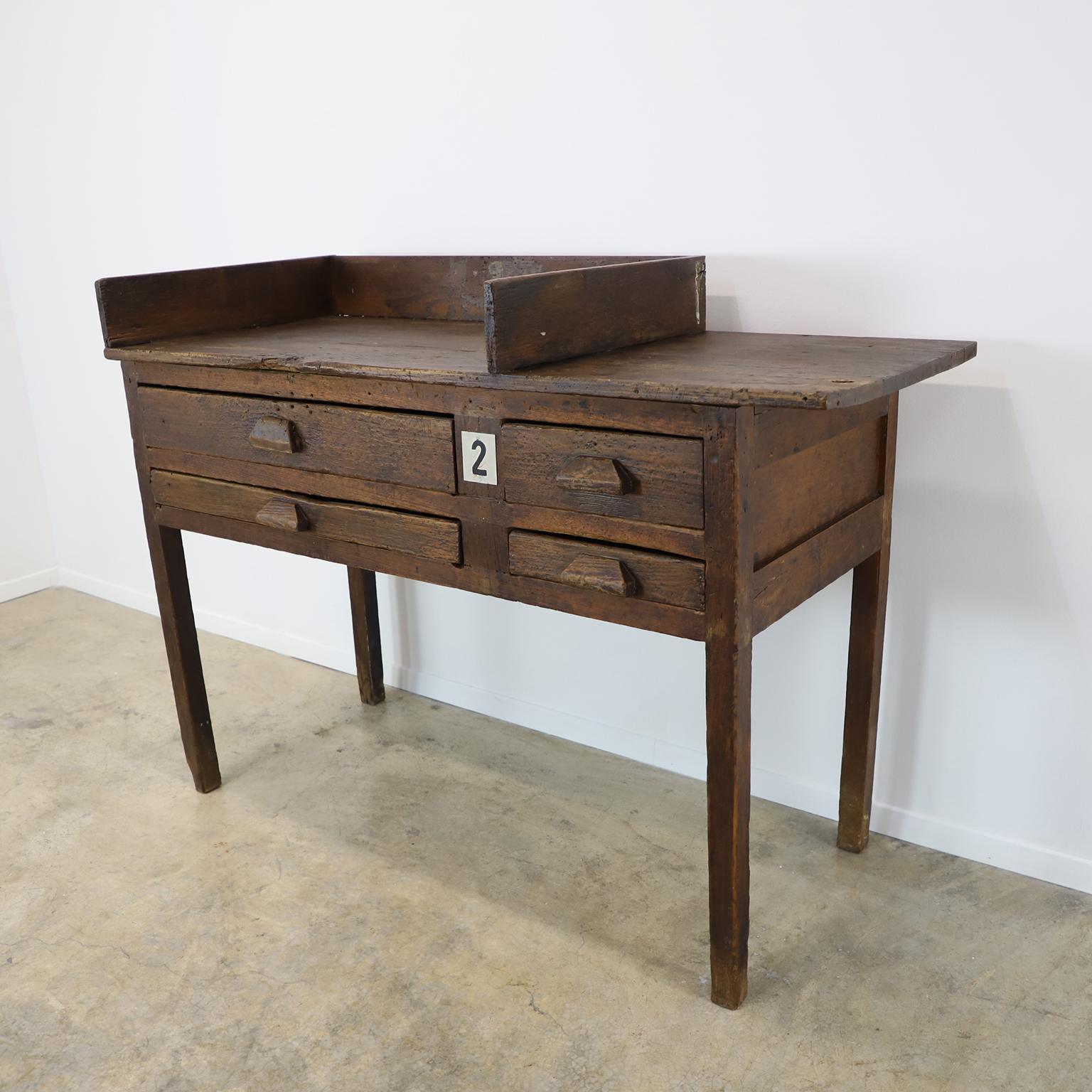 Circa 1930. We offer a most unique antique Mexican Industrial Jeweler's Bench Work Table with outstanding patina.

The stool and the typewriter is not included.