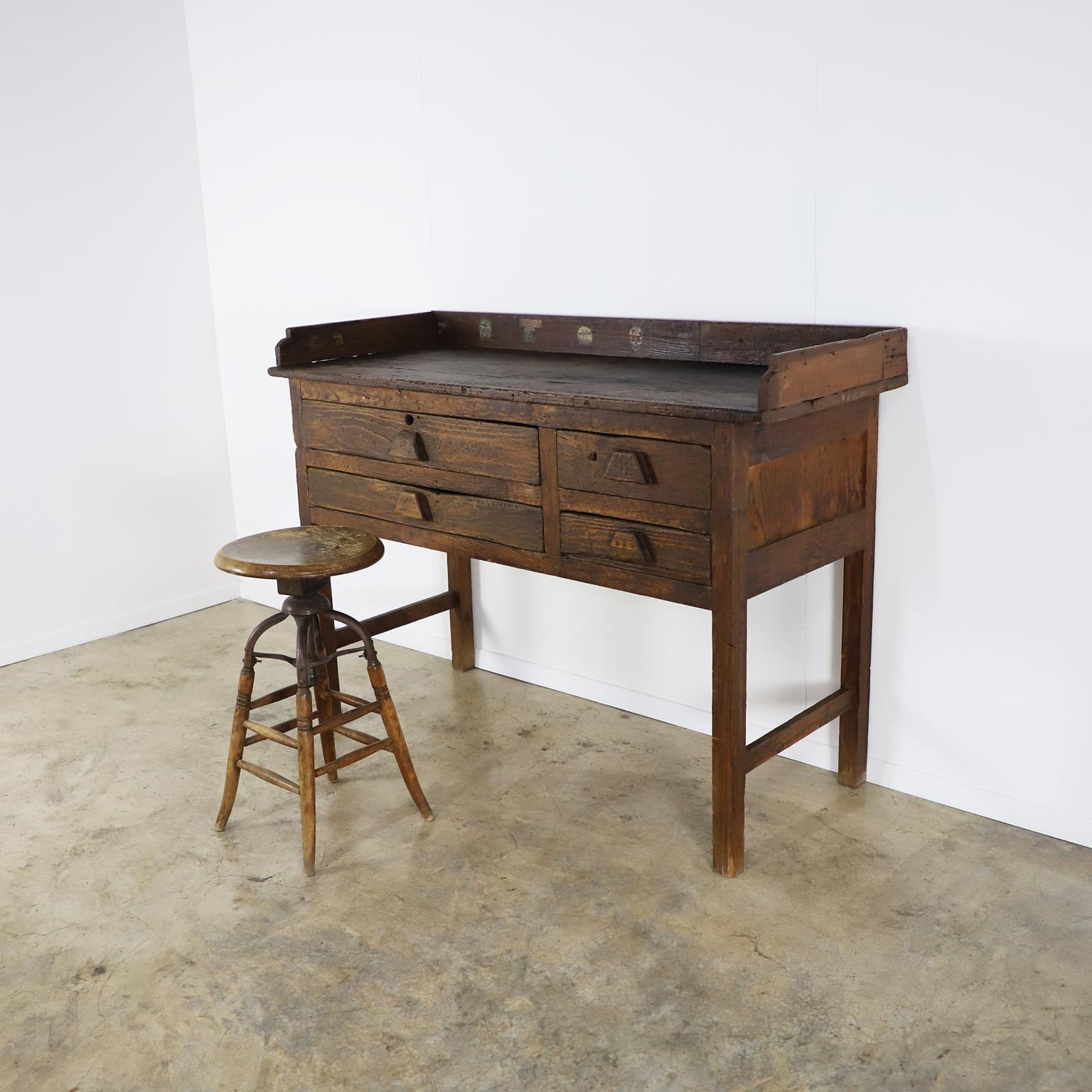 Circa 1930. We offer a most unique antique Mexican Industrial Jeweler's Bench Work Table with outstanding patina.

The stool is not included.