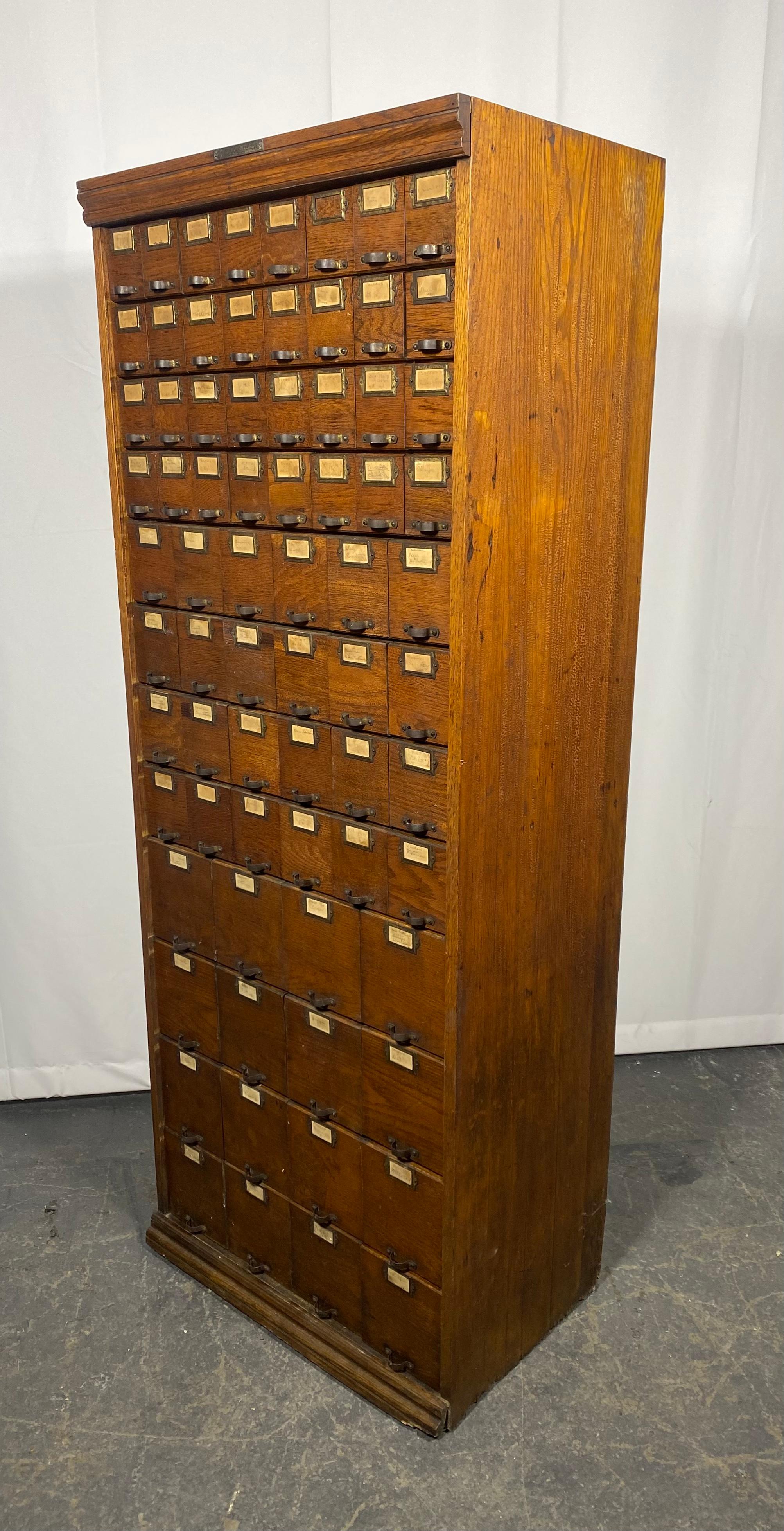 Antique Industrial Oak Multi-Drawer Hardware Store Cabinet by WC Heller.. Amazing patina ,proportion.. and design,, 72 drawers,, graduating in size.Oak fronts / galvanized tin drawers, MINOR RUST TO BACKSIDE ,, Hand delivery avail to New York City