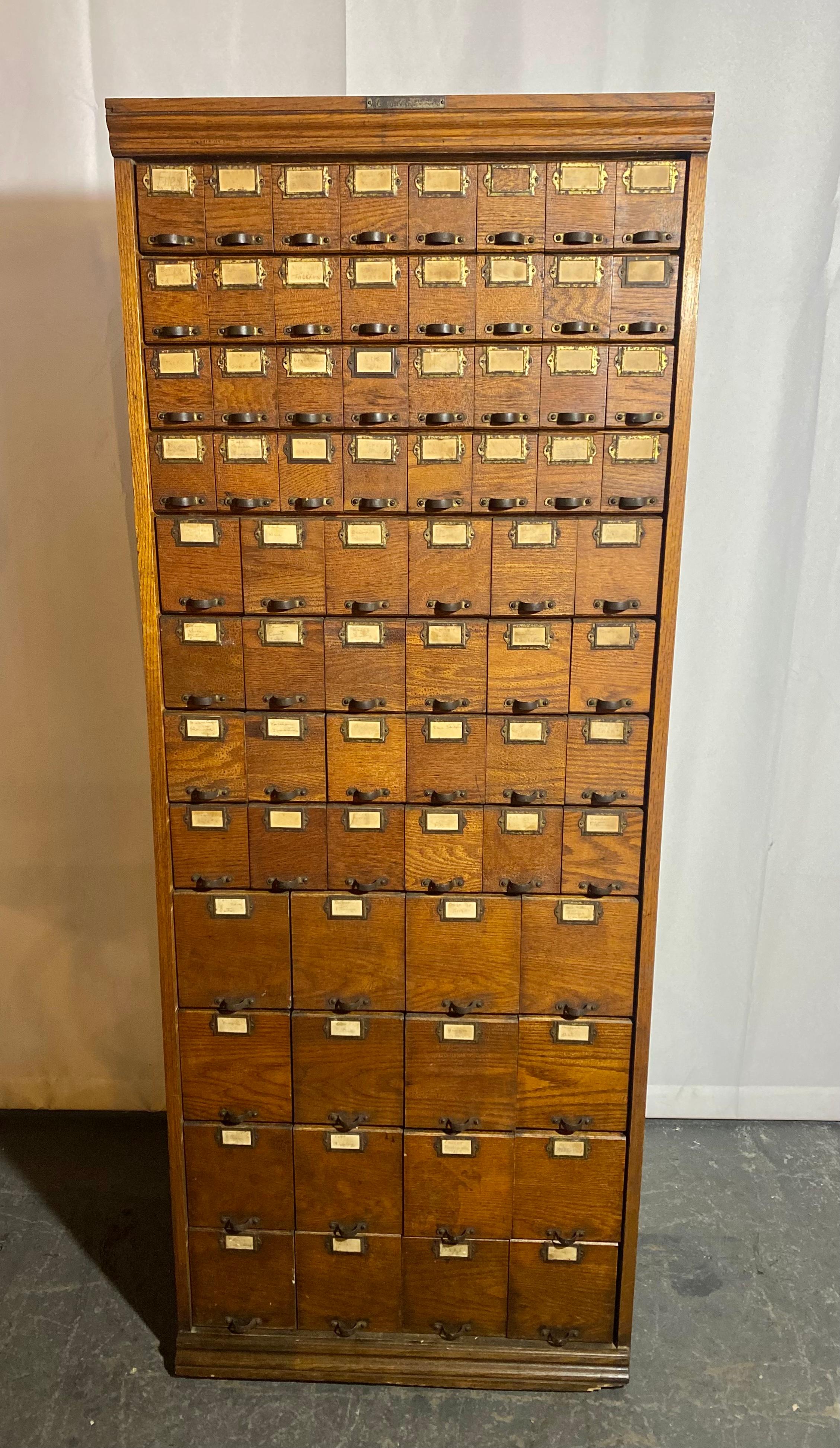 Antique Industrial Oak Multi-Drawer Hardware Store Apothecary by WC Heller In Good Condition For Sale In Buffalo, NY