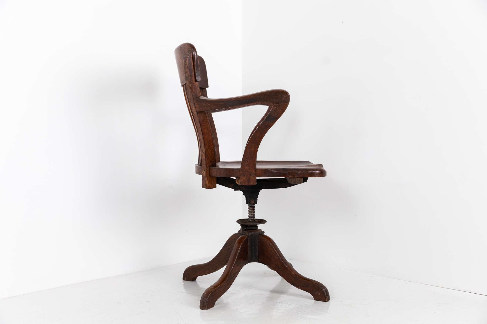 

Oak framed desk chair of exceptional quality made in France by Scholz Star. c.1940

Swivel base with ergonomic shaped seat. Original makers label intact to rear of chair.
