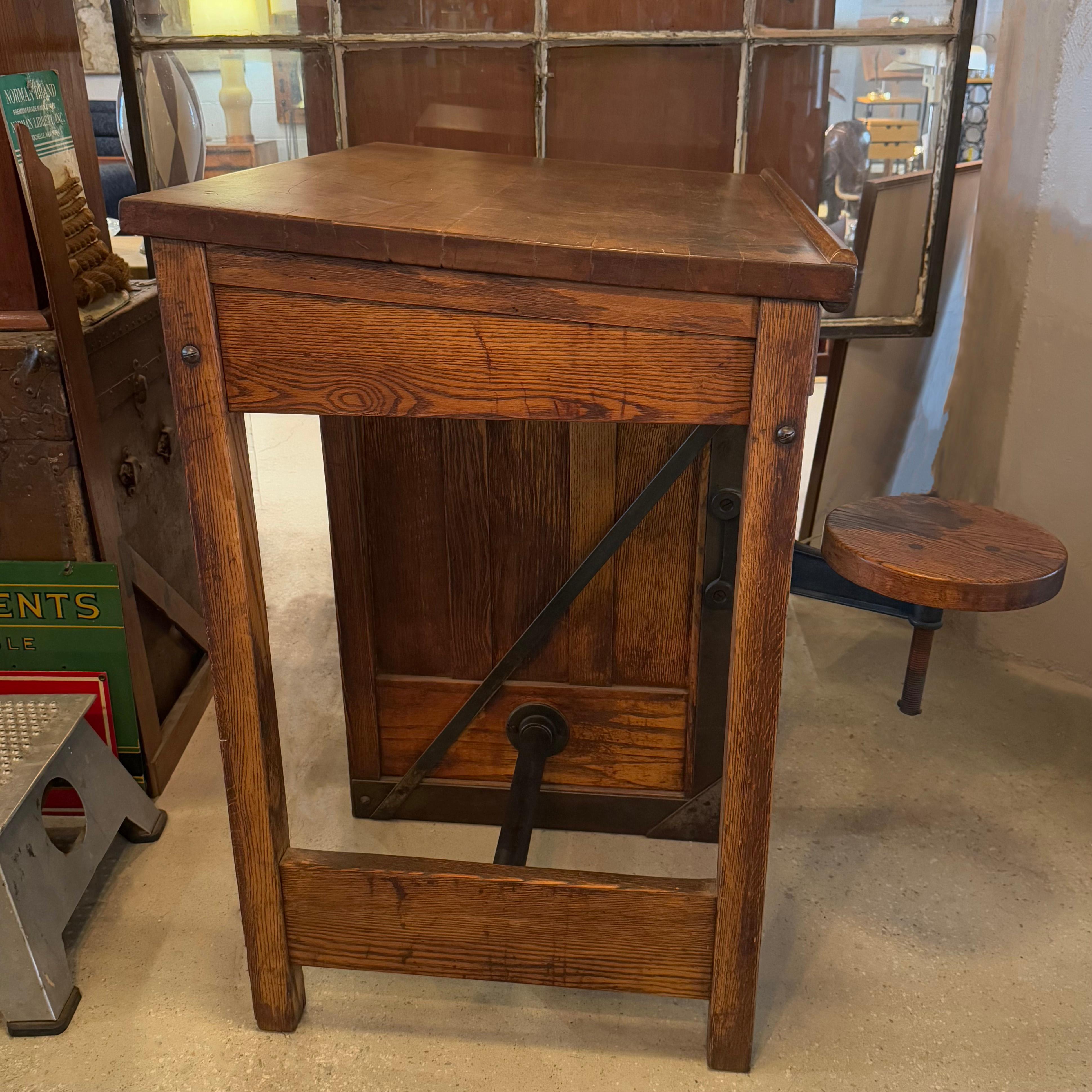 Iron Antique Industrial Oak Wood Typesetter Desk With Swing-Out Seat For Sale