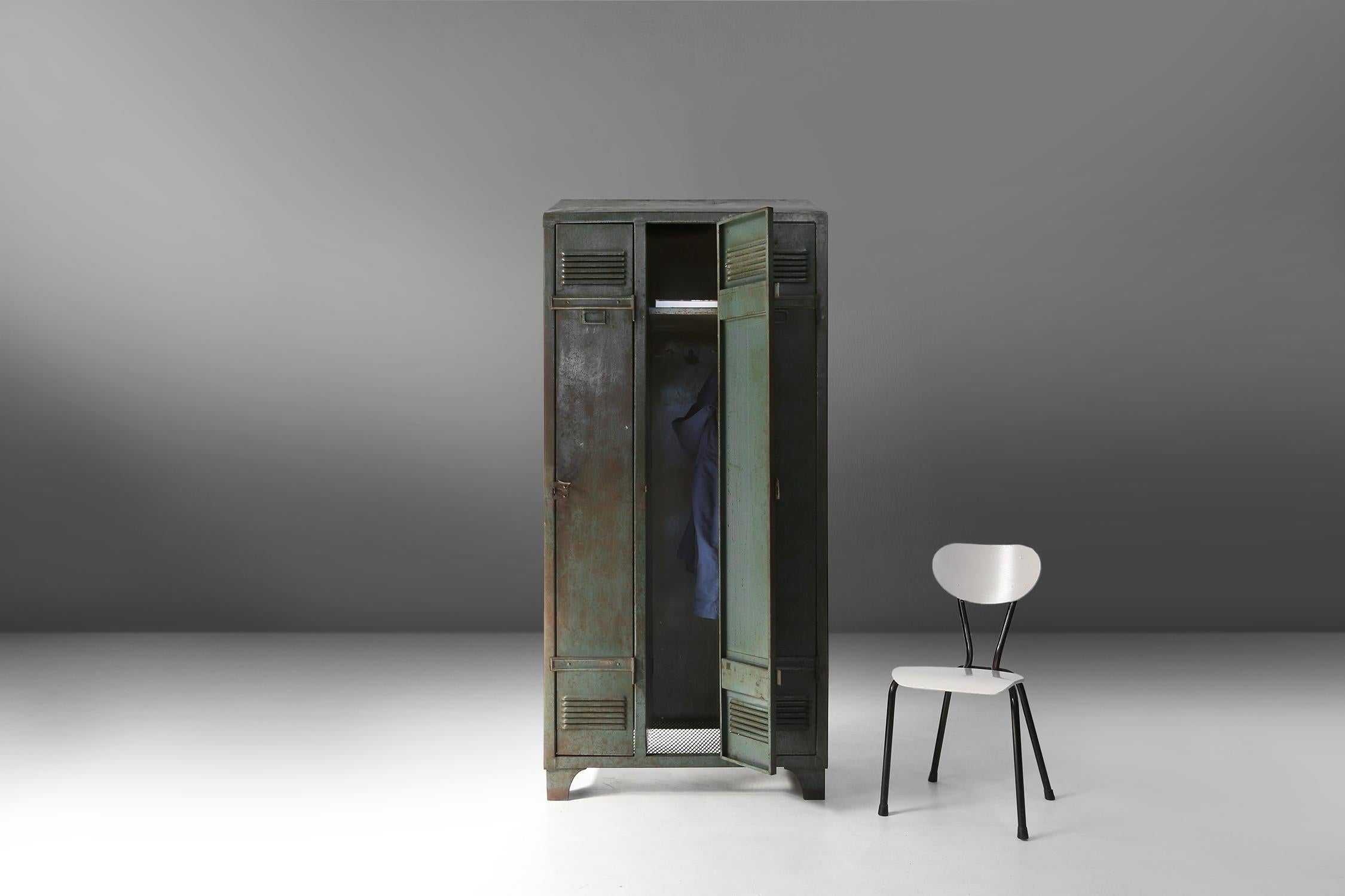 Made around 1910 in France, this locker has three compartments to store all your belongings. The locker has a dark green-grey colour that goes perfectly with any style.

The locker also has a rustic and weathered look that is a testament to its
