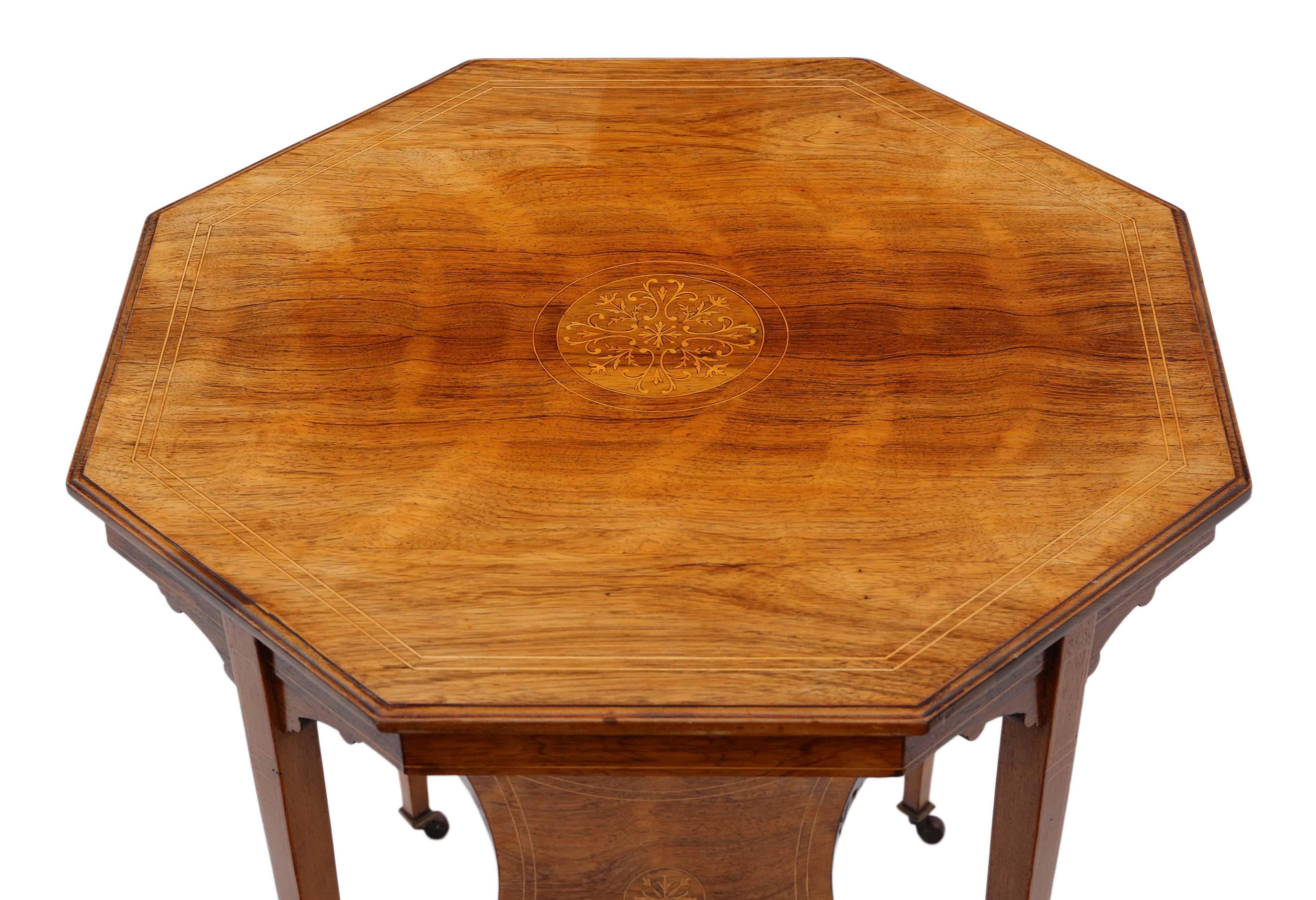 Antique fine quality inlaid Victorian 19th century inlaid rosewood octagonal centre, window, side or occasional table. C1895.

No loose joints and no woodworm. A rare decorative find, with a lovely light colour, shaped under tier and marquetry