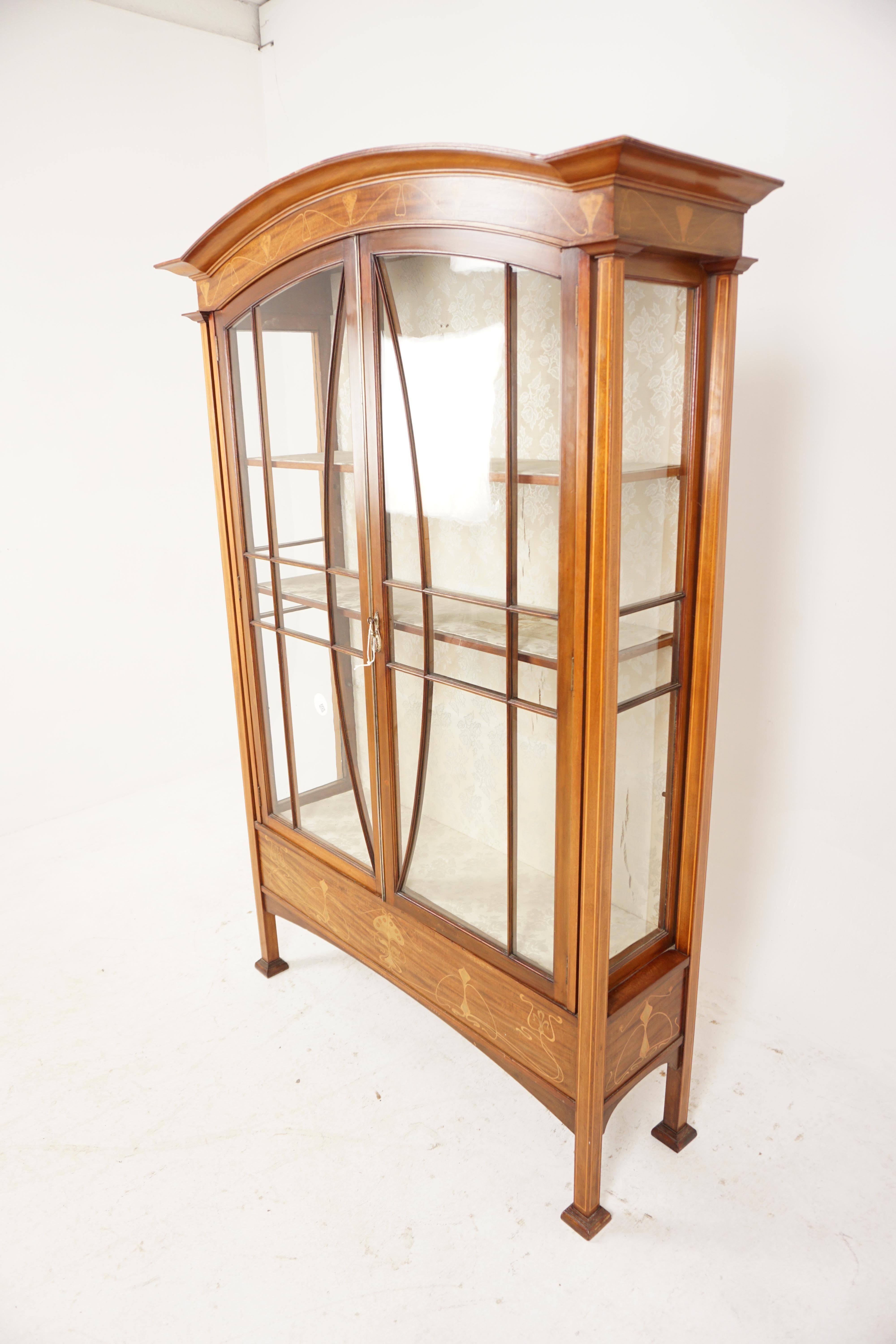 Antique Inlaid Art Nouveau Walnut Display China Cabinet, Scotland 1910, H1001

Solid walnut + veneers
Original Finish
Curved inlaid cornice on top
Pair of original glass doors
Flanked by inlaid pillars on the sides
Working lock and key
Below inlaid