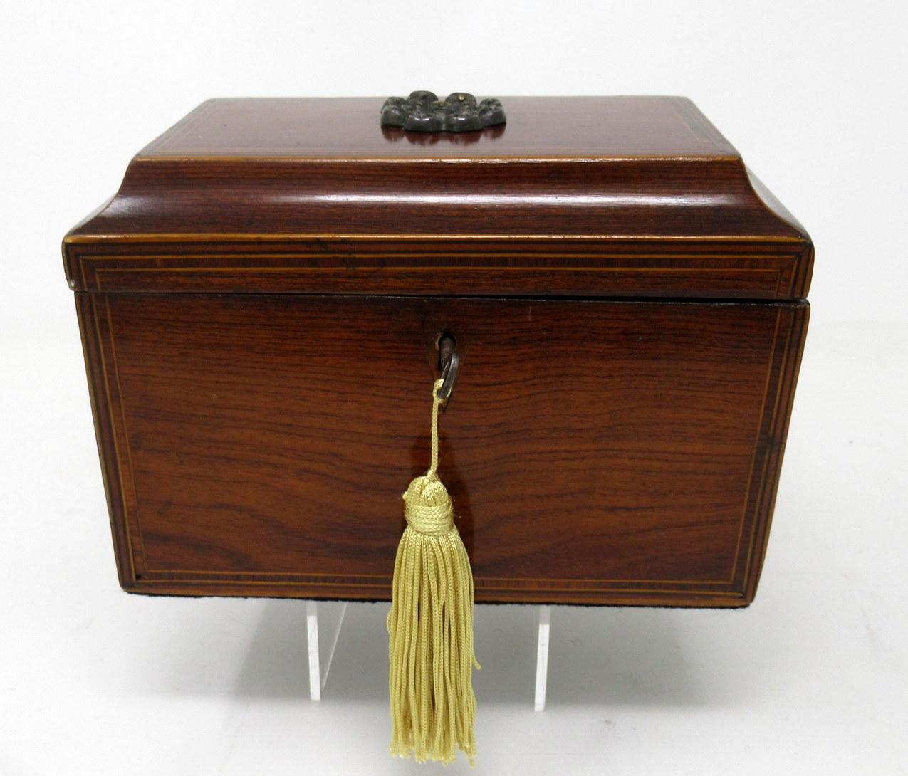 A stylish example of an English late Regency period well grained flame mahogany double interior section tea caddy of rectangular outline and compact size, the hinged Pagoda style lid with inlaid edging of boxwood stringing. 

First quarter of the
