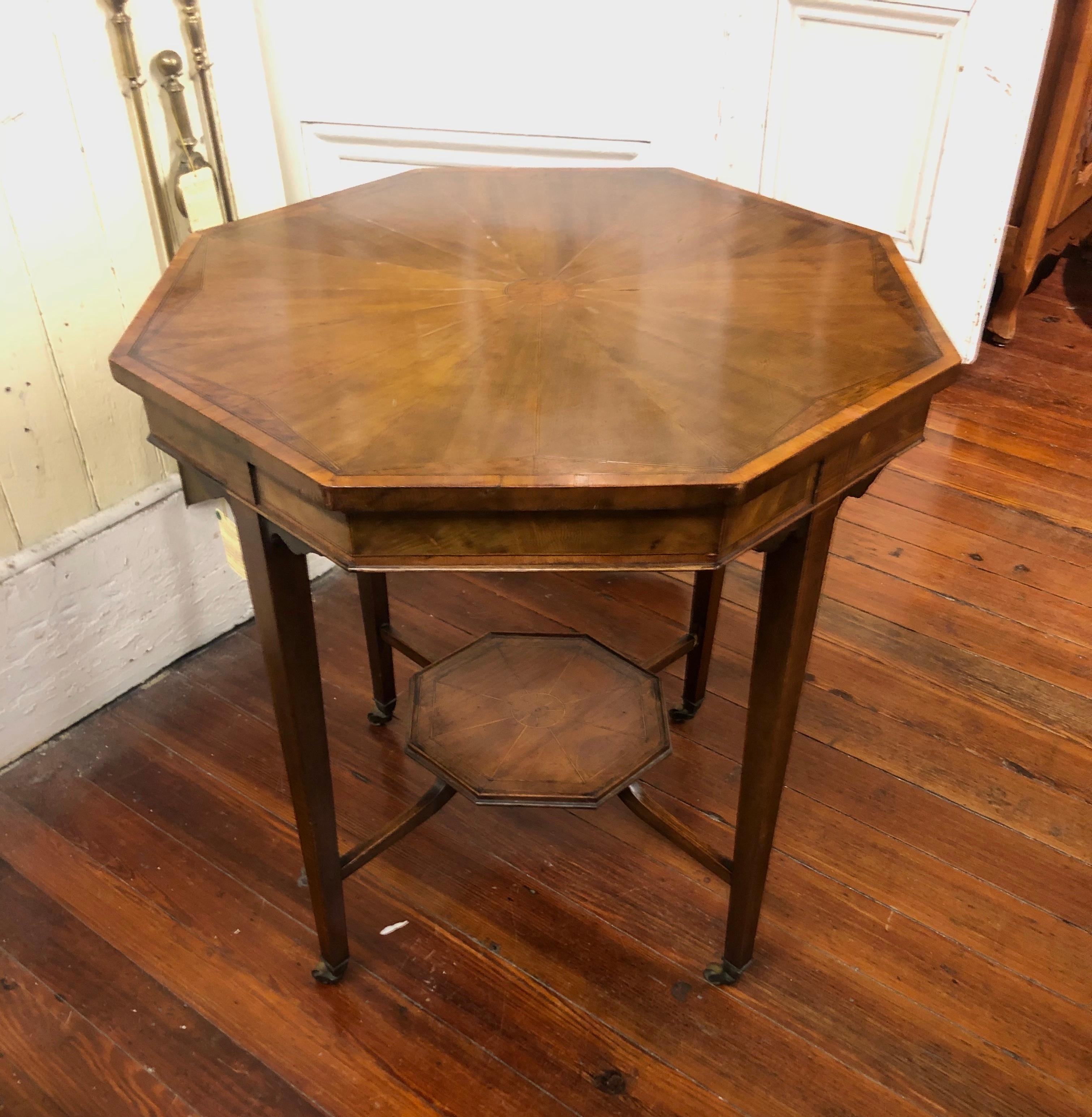 Fine octagonal mahogany burr elm and satinwood occasional table.