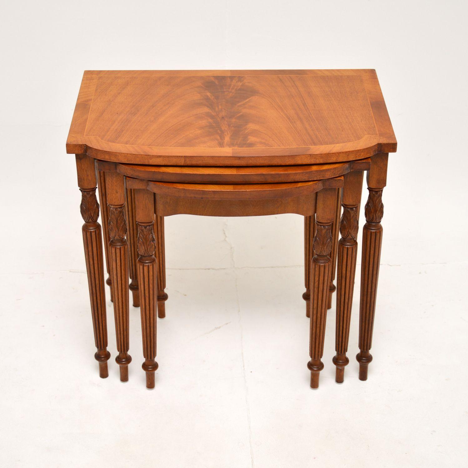 A beautifully made antique inlaid nest of three tables. They were made in England, they date from around the 1950’s.

The quality is superb, they have gorgeous tops with cross banded edges, and sit on finely fluted legs with crisply carved acanthus