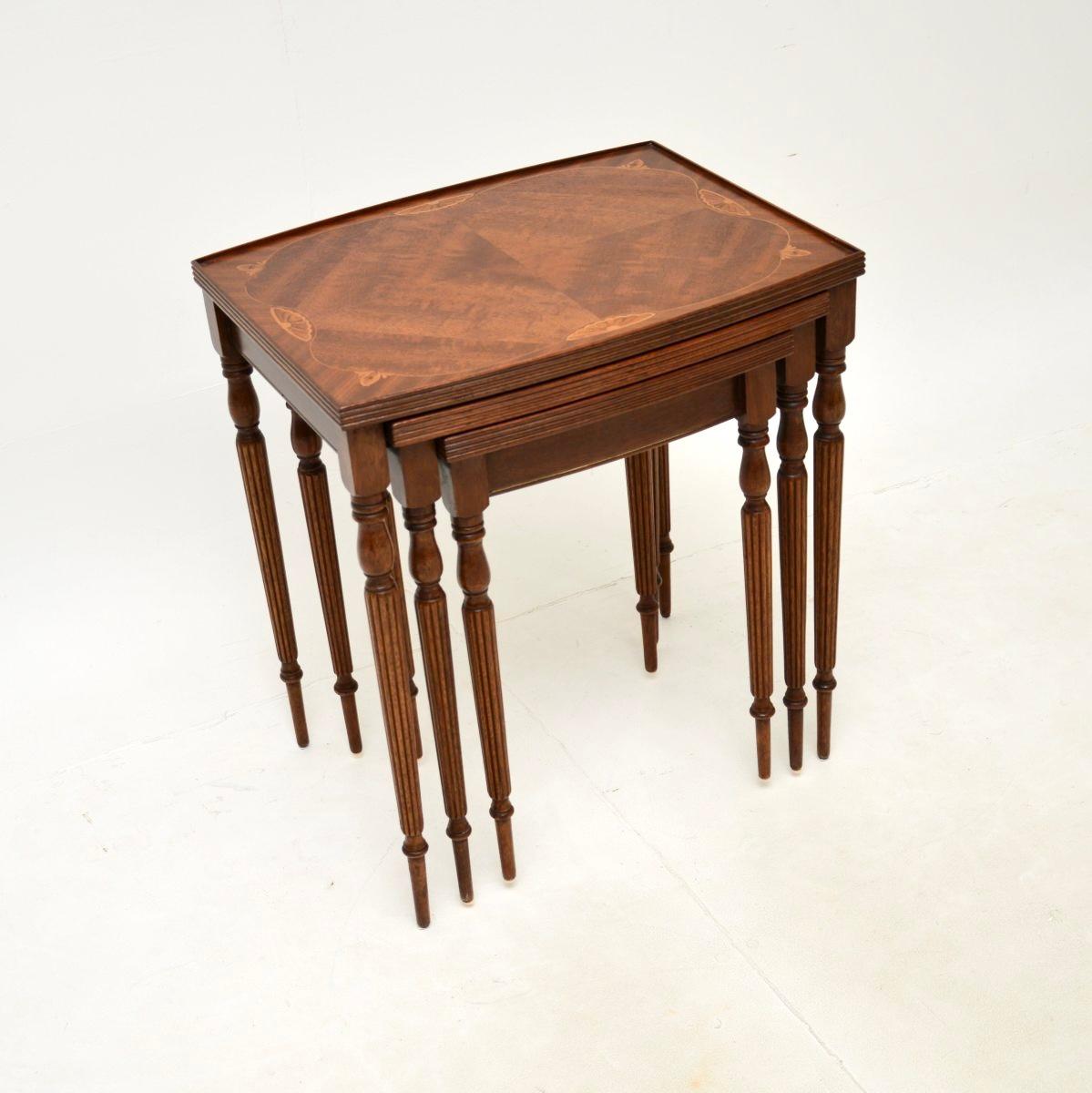 A beautiful antique inlaid satinwood nest of tables, dating from around the 1930’s.

They are of lovely quality and has a gorgeous design. They have inlaid satinwood tops with walnut banding, they sit on wonderfully turned and fluted legs. The