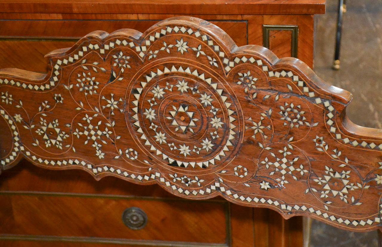 Beautiful decorative armchair from Syria with inlaid ivory. So unique. A real conversation piece!