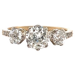 Antique Inspired Diamond 18 Karat Platinum Three Stone Engagement Ring