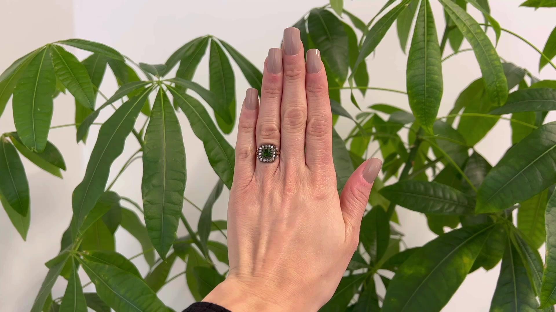 One Antique Inspired Peridot Silver 14 Karat Yellow Gold Ring. Featuring one square mixed cut peridot weighing approximately 1.00 carat. Accented by 16 single cut diamonds with a total weight of approximately 0.25 carat, graded I color, SI clarity.