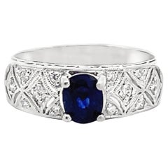 Anello in platino con diamanti e zaffiri di ispirazione antica