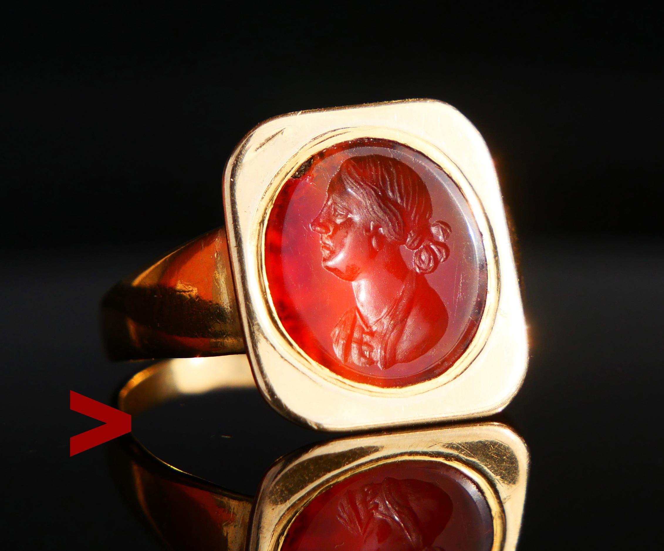 Signet intaglio Ring featuring natural Carnelian stone with naturalistic and symbolic intaglio of a middle aged Woman - Wife , Mother or Sister measuring 10 mm x 5 mm . The body of the stone is dark Orange measuring 12 mm x 10 / ca. 5 ct. Very well