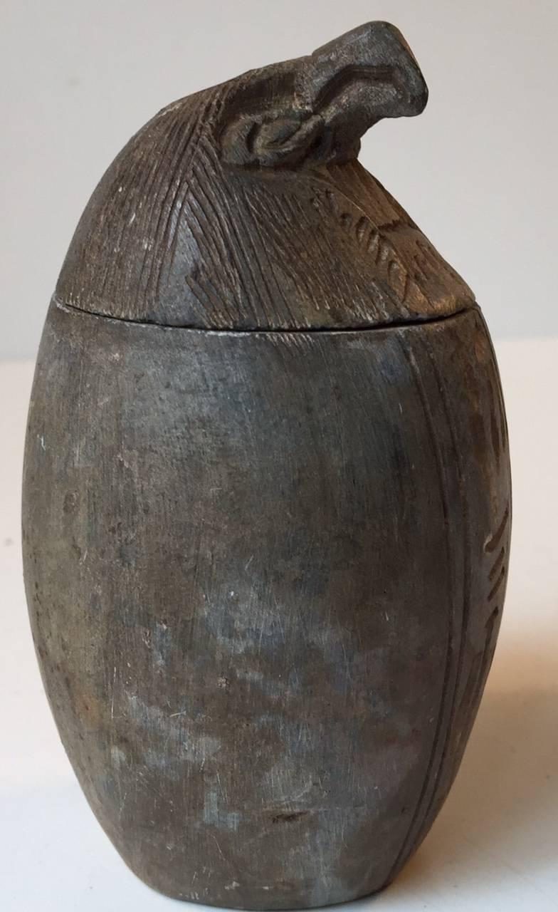 Small storage statue or Jar made from burned alabaster/soap stone. This Canopic jar is depicting the Falcon-headed Qebehsenuef that was the protector of the intestines while the Pharaoh were Buried. The lid and jar has matching initials/markings.