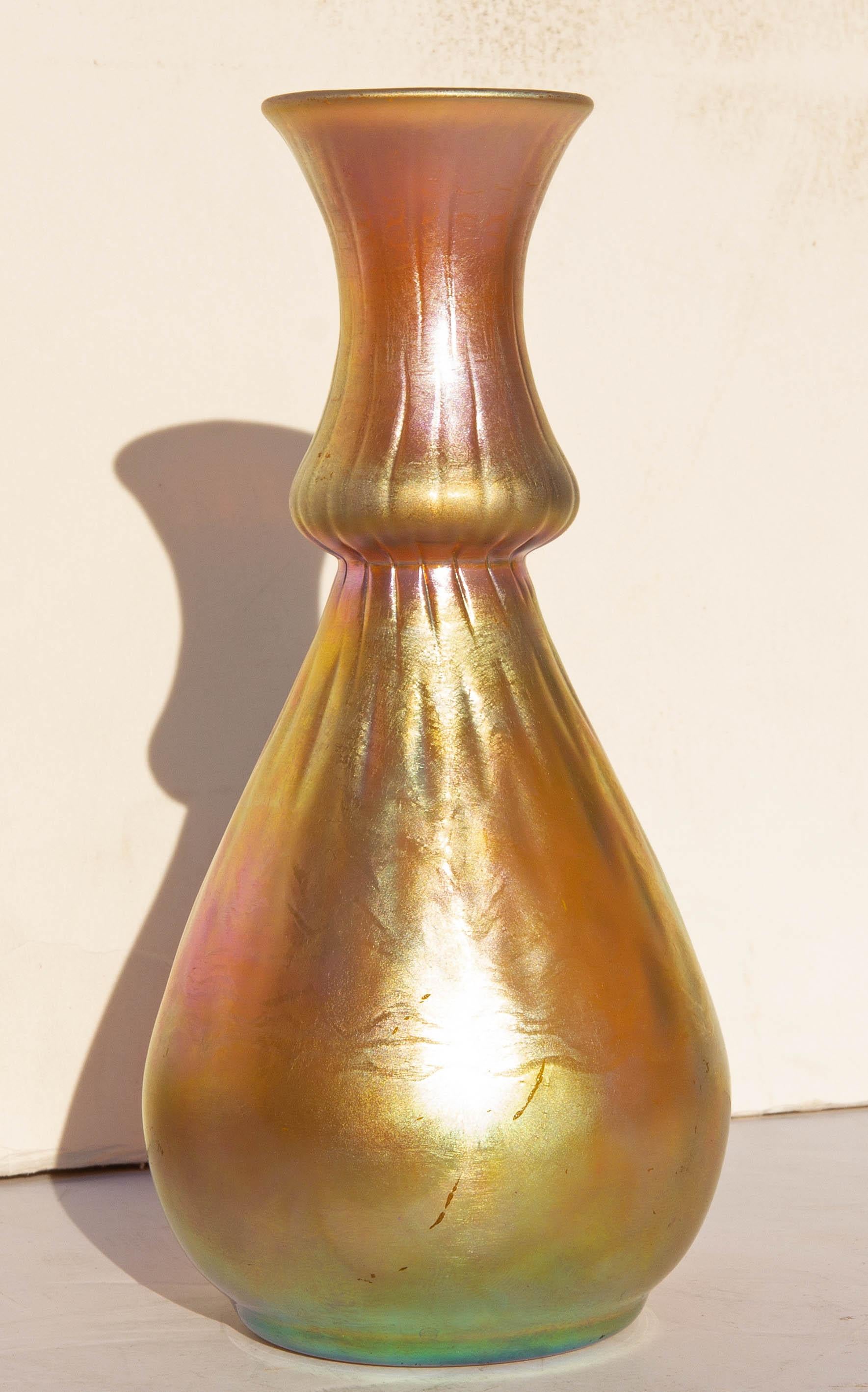 Steuben Aurene art glass iridescent cabinet vase. Various shades of iridescent gold, pink, mauve and green, circa 1920s.