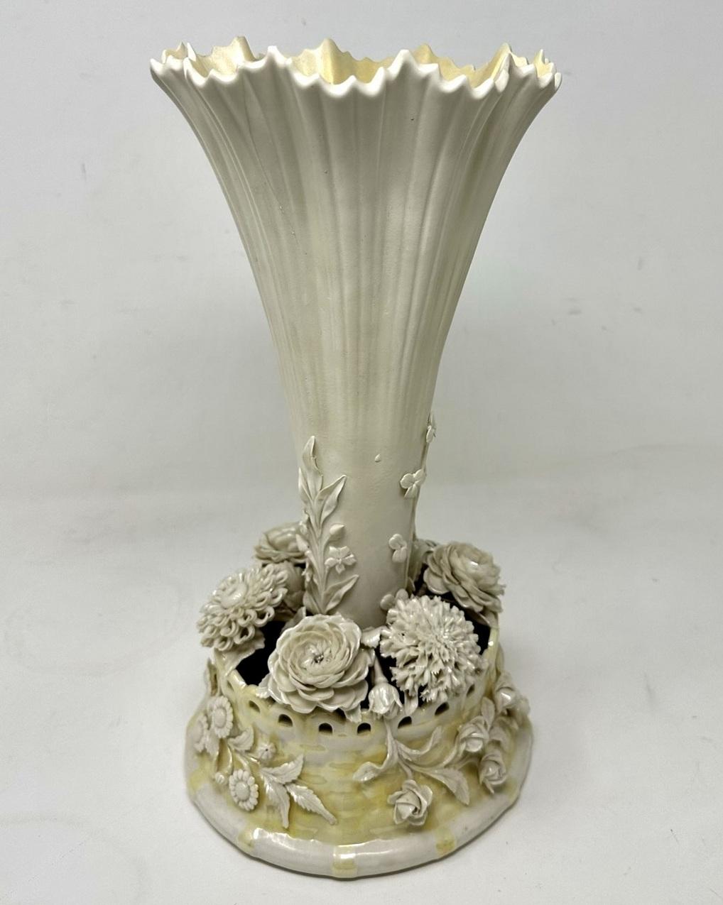 An Exceptionally Fine Quality Irish Belleek Porcelain Pleated and Flared Trumpet formed Centerpiece of museum quality. Third black mark for 1926 to 1946 

The main flaired body above a lavish molded circular spreading basket base with superbly