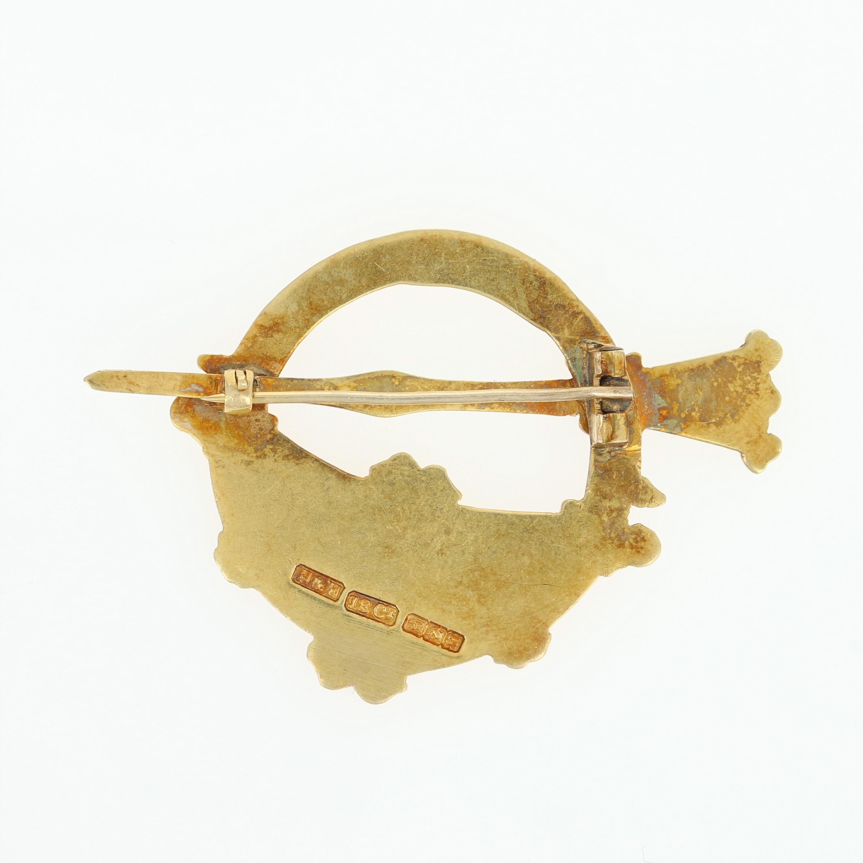 gold celtic brooch