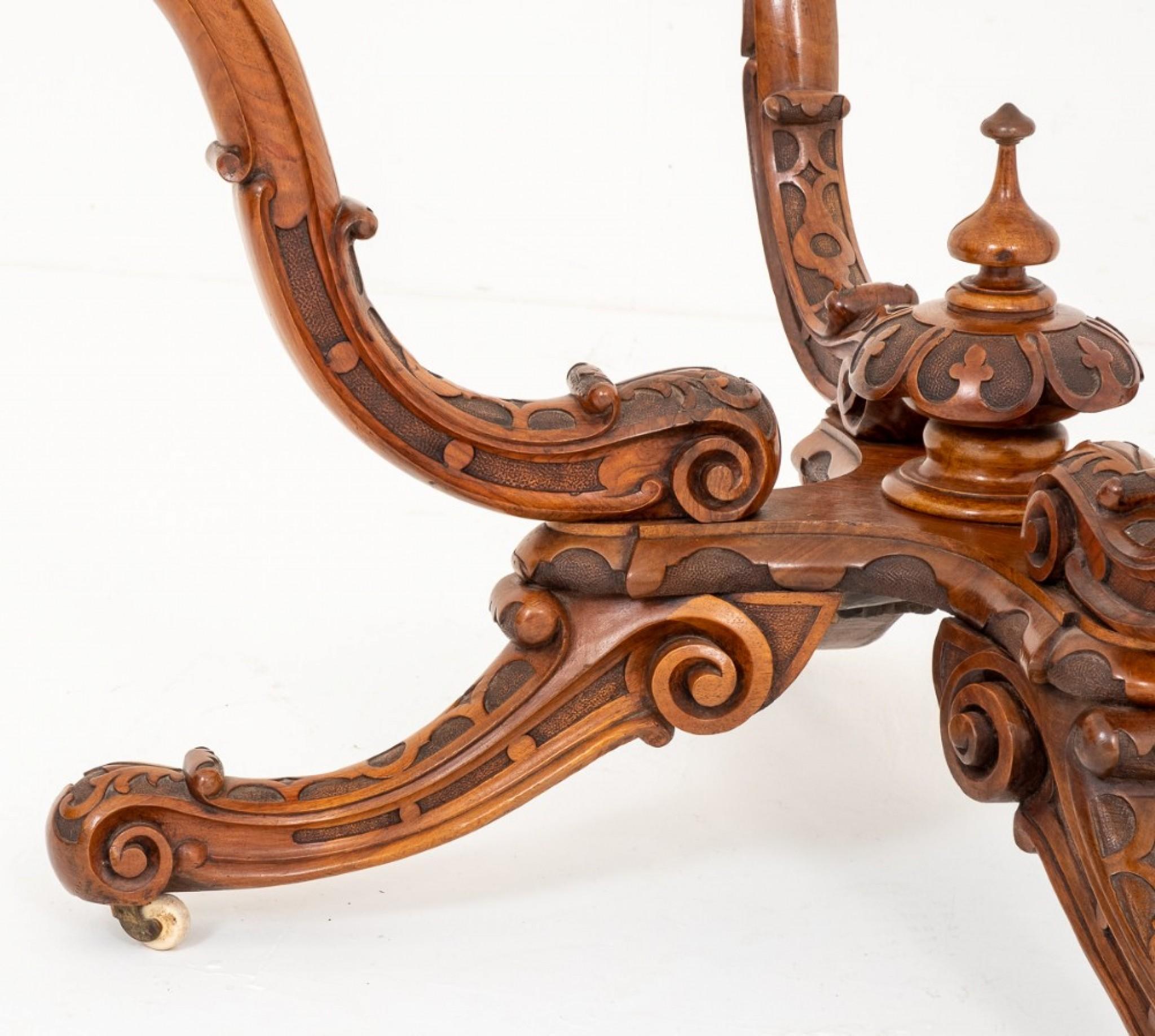 Exceptional Burr Walnut Irish Centre Table.
circa 1860
Having the most amazing Quartered Burr Walnut Veneers to the Shaped Top.
The mouldings with typical Irish Detail.
The Basket Base having swept carved legs, shaped carved supports and a