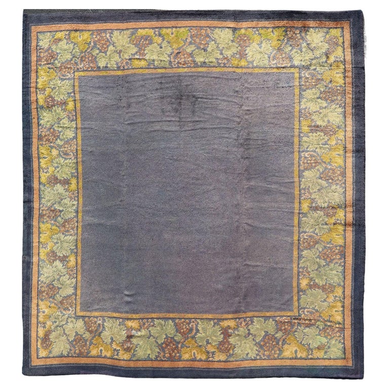 Antique Irish Donegal Carpet in solid Purple Background and Floral ...