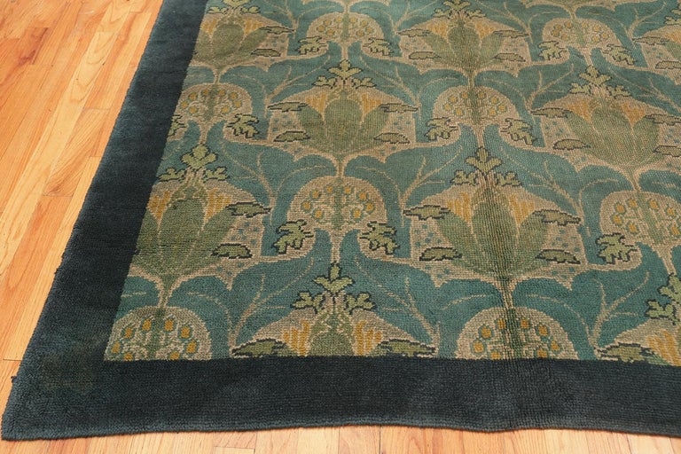 Large Antique Irish Donegal Arts and Crafts Rug. Size 10 ft 9 in x 15