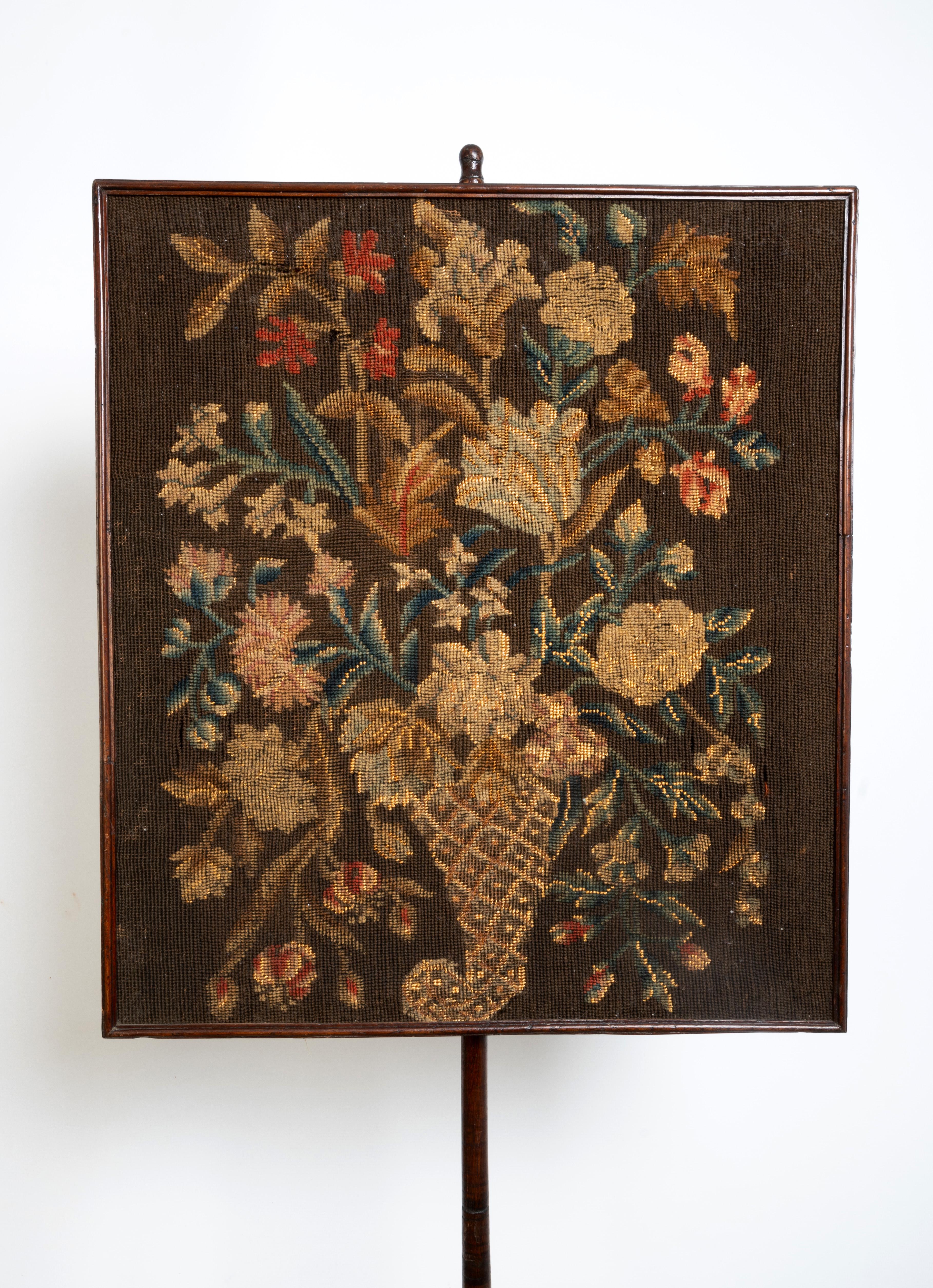 Antique Irish George II Needlework Panel Pole Screen C.1730

Depicting a still life of flowers, on a turned stem, the tripod base carved with scallop shells, on pad feet.
168cm high x 55cm wide
Dimensions:
Framed Tapestry: 55.5 x 62.5cm

Provenance: