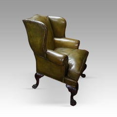 Antique Irish green leather wingchairs