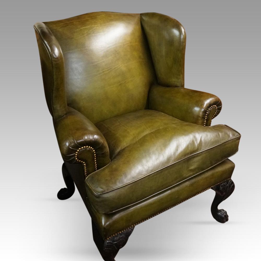 Dyed Antique Irish green leather wingchairs For Sale
