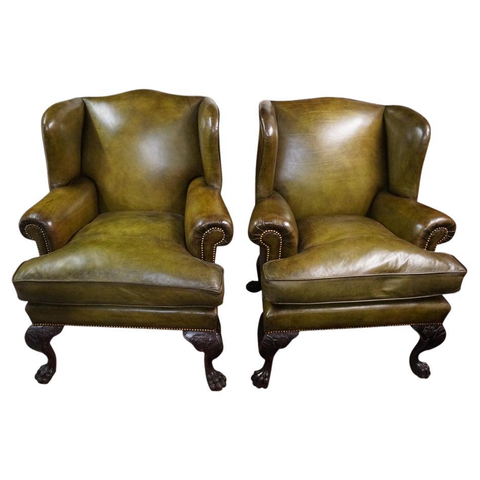 Antique Irish green leather wingchairs For Sale