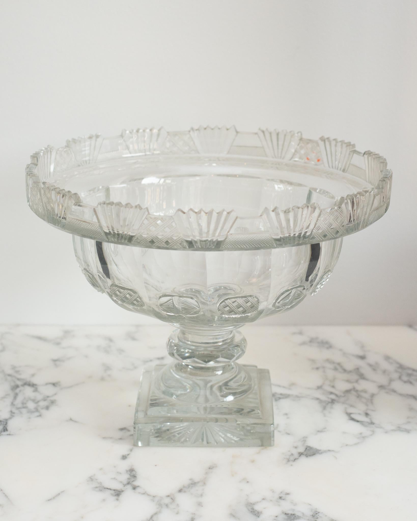 This antique Irish large cut crystal decorative bowl is a Classic accessory that is easy to place in any home. Perfect for serving or decoration, it can be filled fruit or floating flowers.
